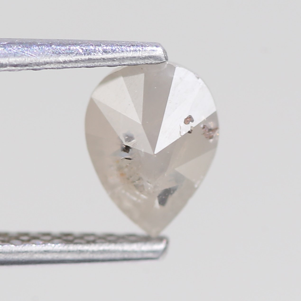 0.76 Carat Natural Icy Grey Pear Salt And Pepper Diamond 6.82 MM