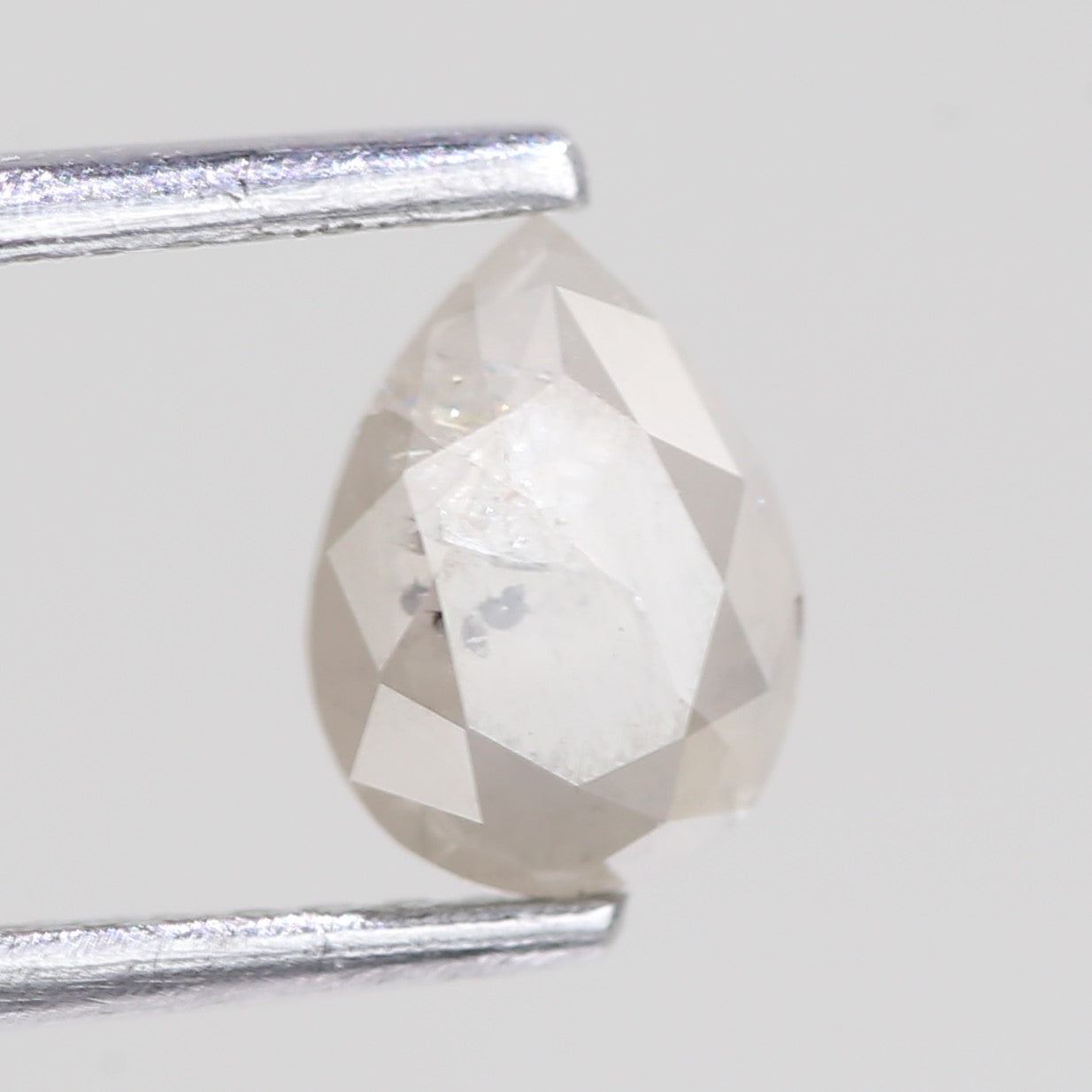 0.76 Carat Natural Icy Grey Pear Salt And Pepper Diamond 6.82 MM