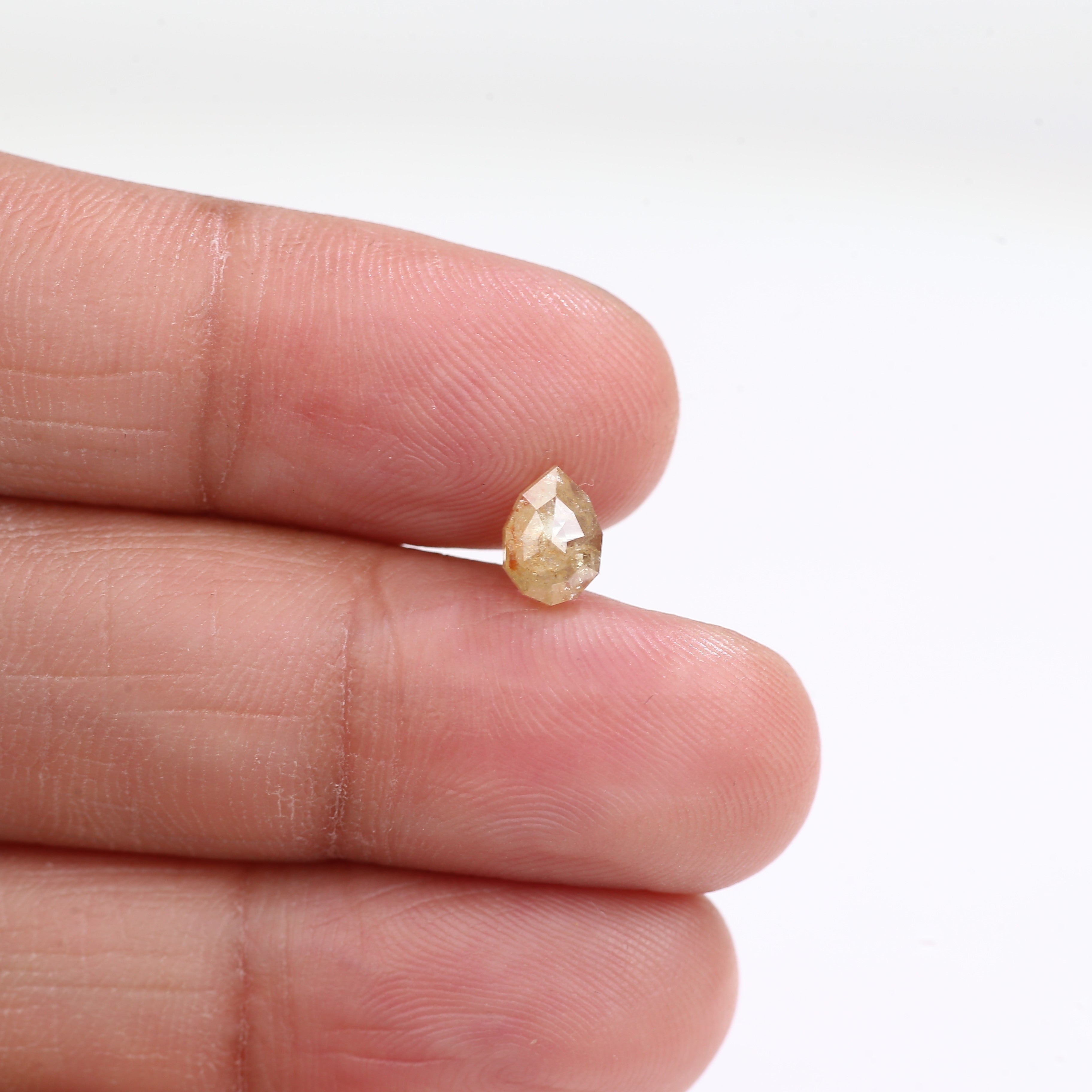 0.74 Carat Natural Light Yellow Pear Cut Salt And Pepper Diamond 6.78 MM