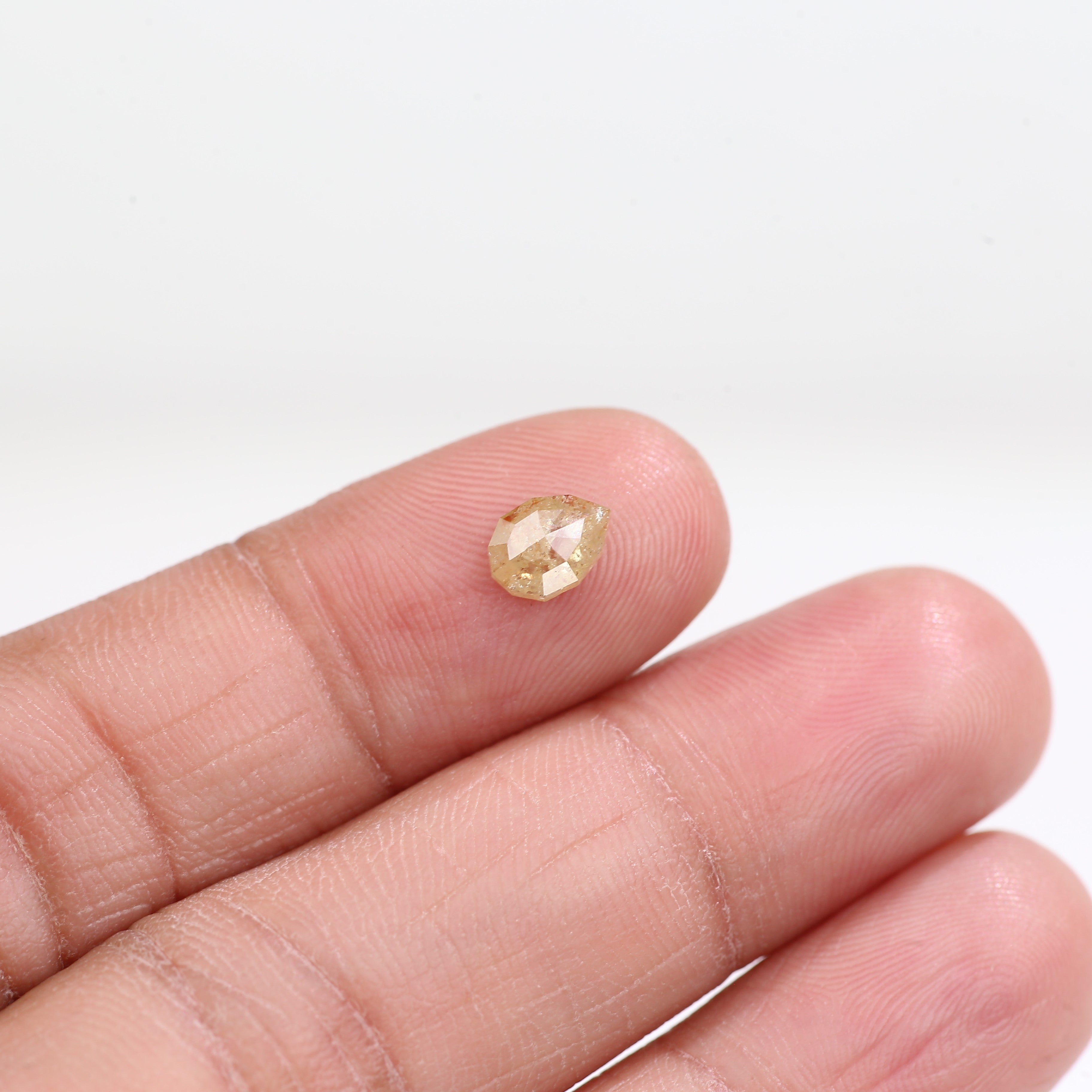 0.74 Carat Natural Light Yellow Pear Cut Salt And Pepper Diamond 6.78 MM