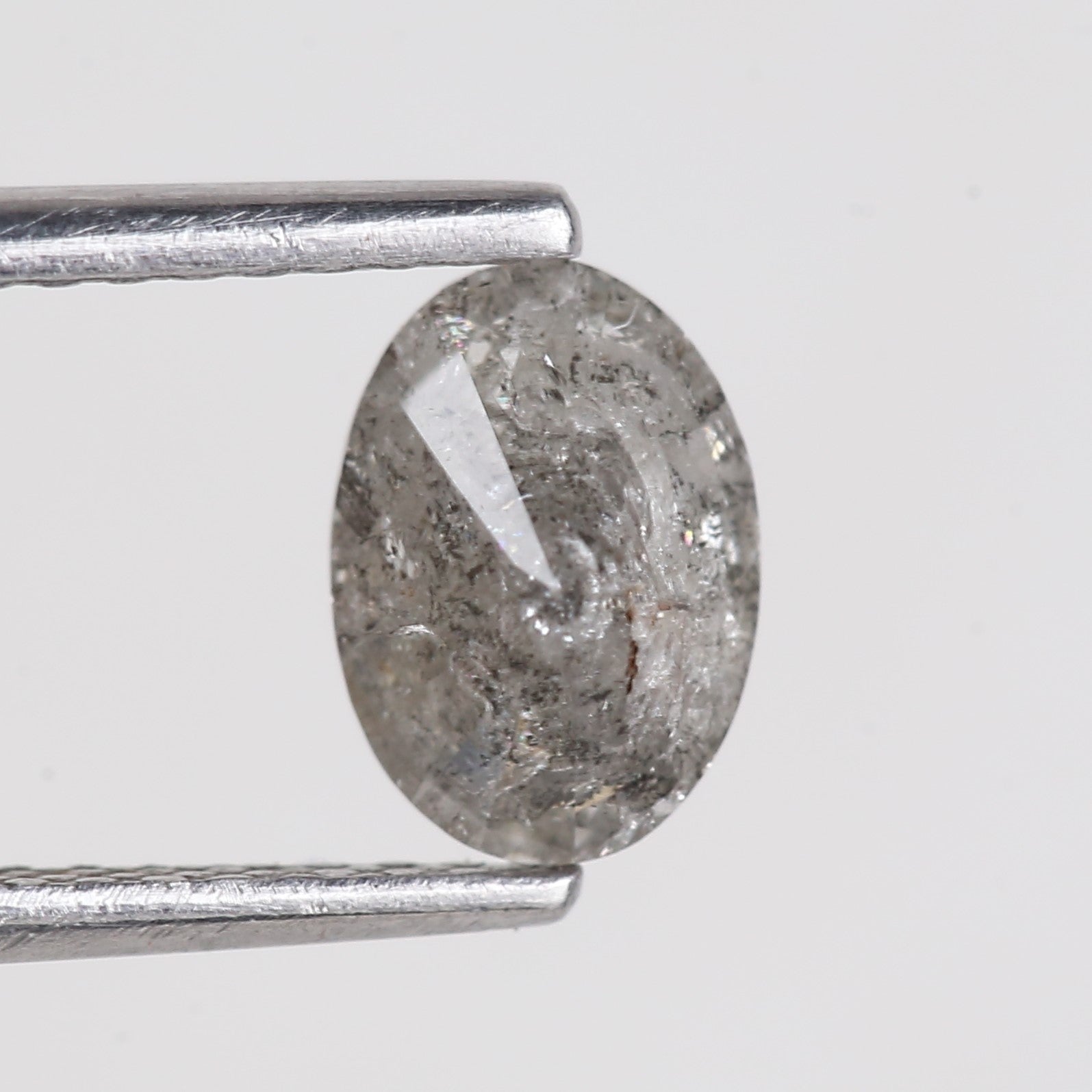 0.87 Carat Natural Grey Oval Cut Brilliant Salt and Pepper Diamond 7.06 MM