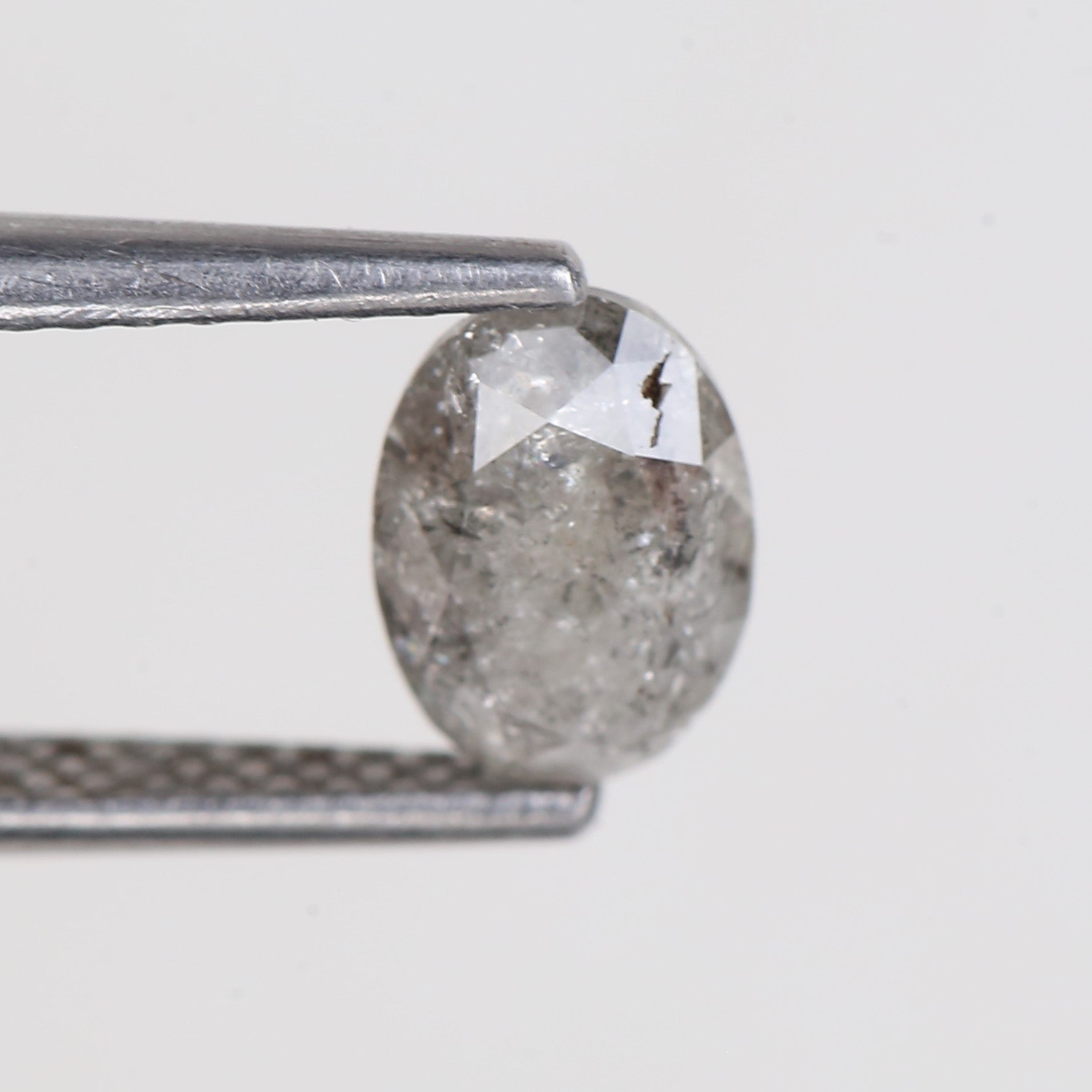 0.87 Carat Natural Grey Oval Cut Brilliant Salt and Pepper Diamond 7.06 MM