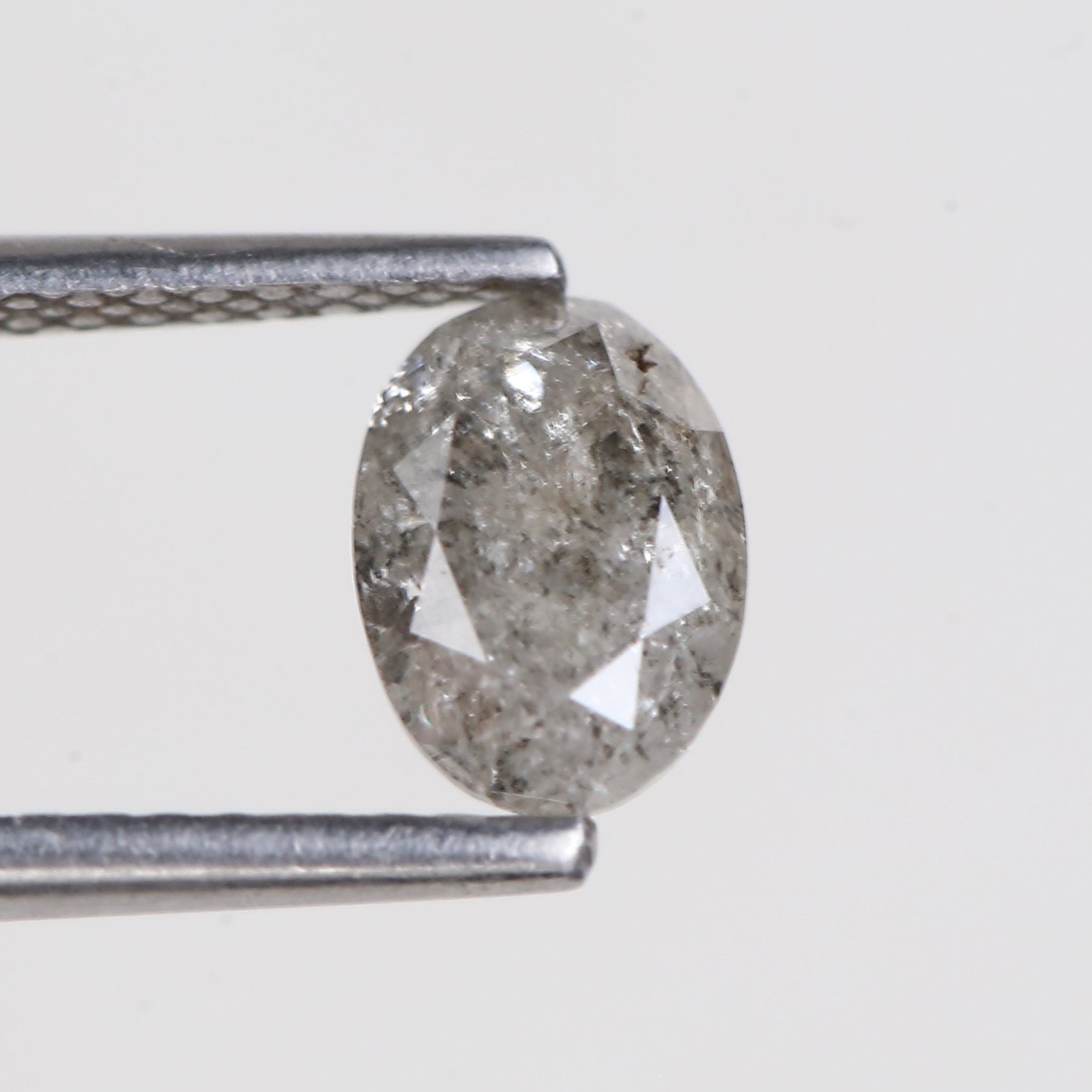0.87 Carat Natural Grey Oval Cut Brilliant Salt and Pepper Diamond 7.06 MM