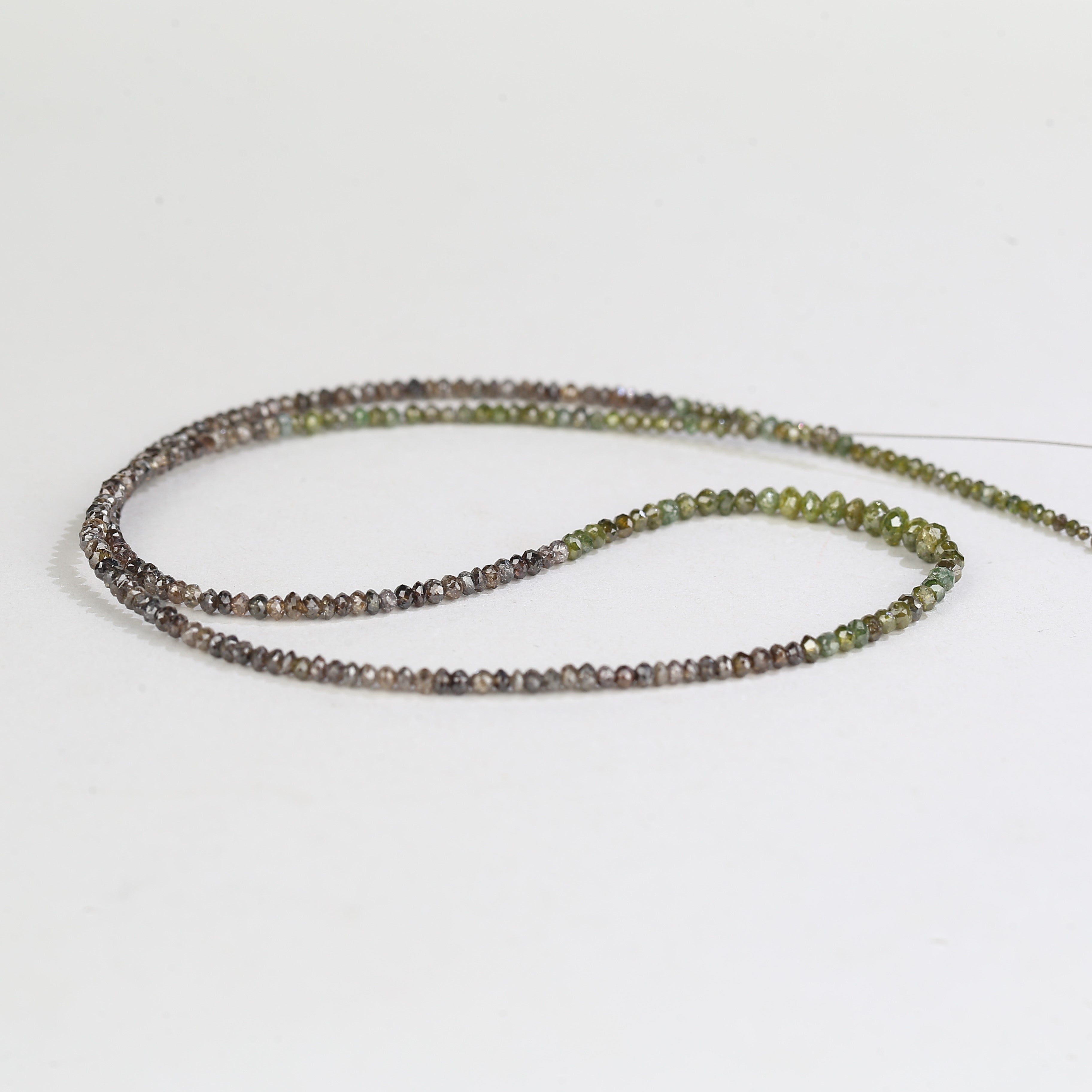 Necklace with small beads on a white background