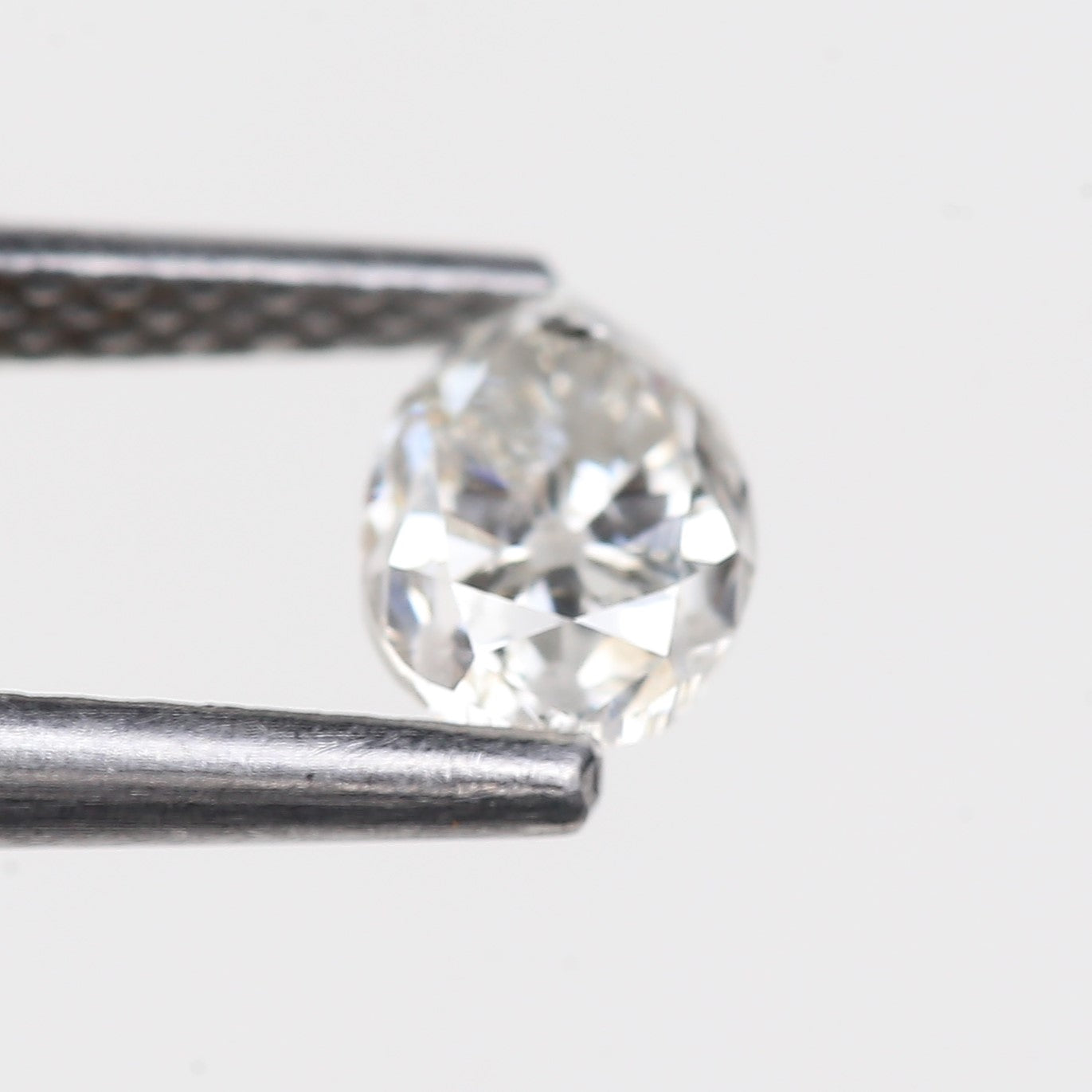 0.49 Carat Natural Pear Salt and Pepper Diamond 5.35 MM
