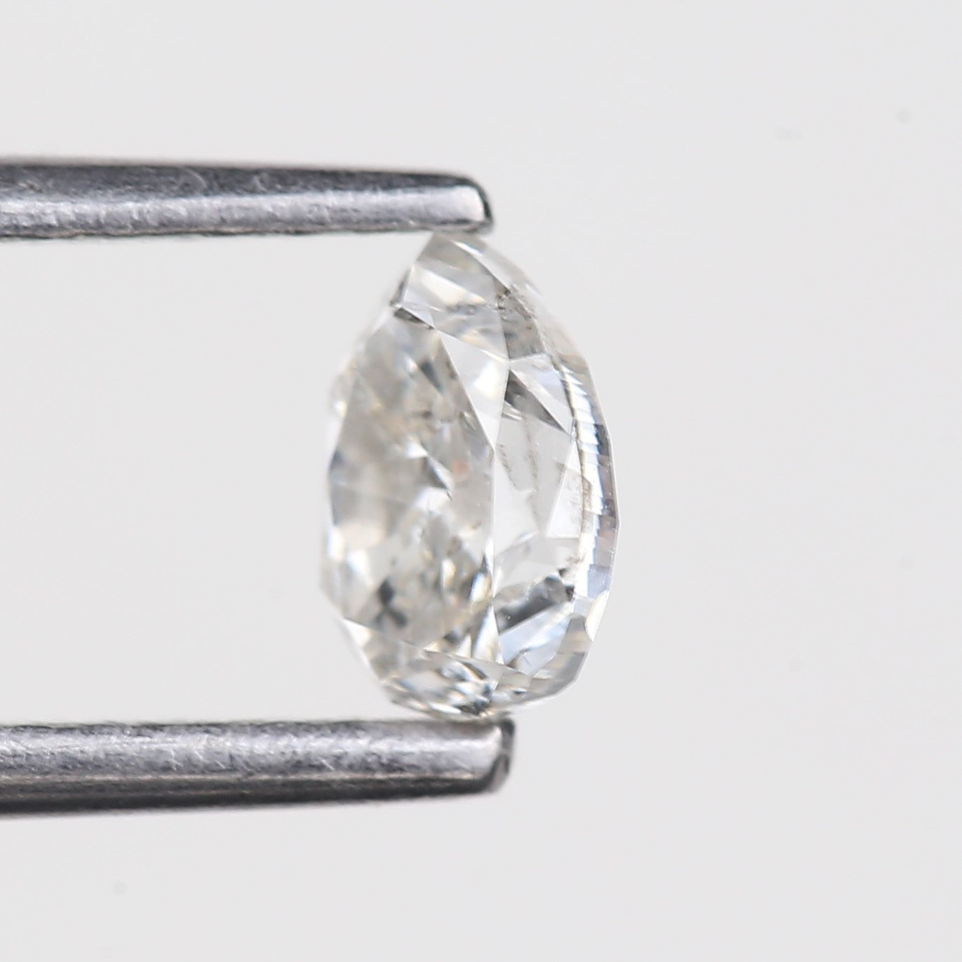 0.49 Carat Natural Pear Salt and Pepper Diamond 5.35 MM