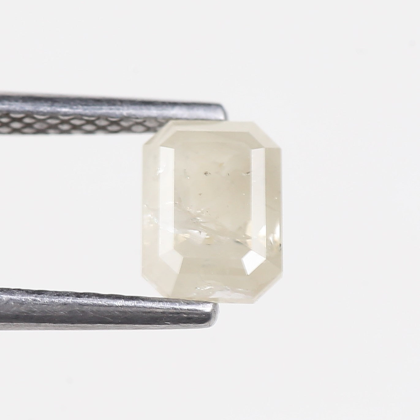 0.87 Carat Emerald Cut Salt and Pepper Diamond 6.37 MM