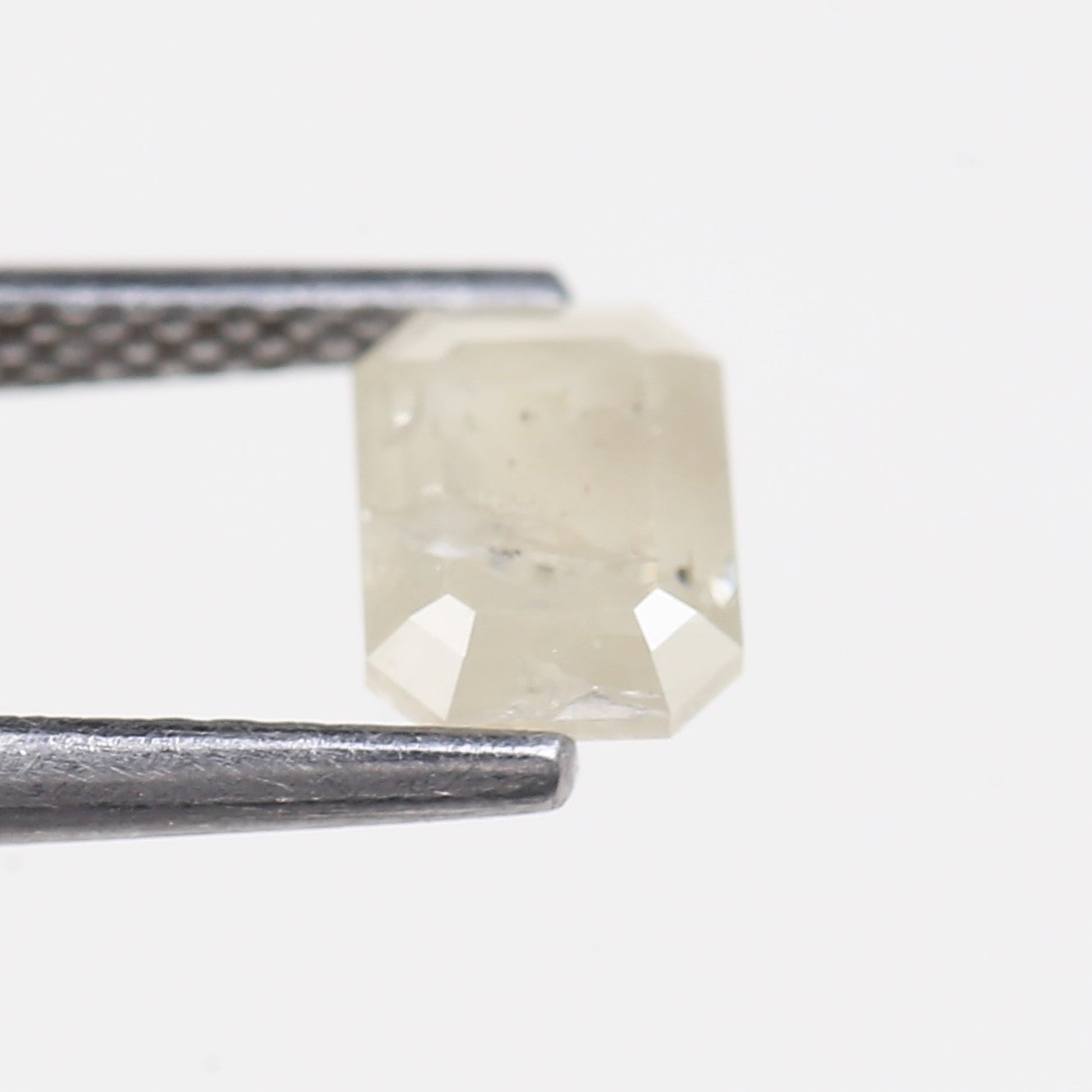 0.87 Carat Emerald Cut Salt and Pepper Diamond 6.37 MM
