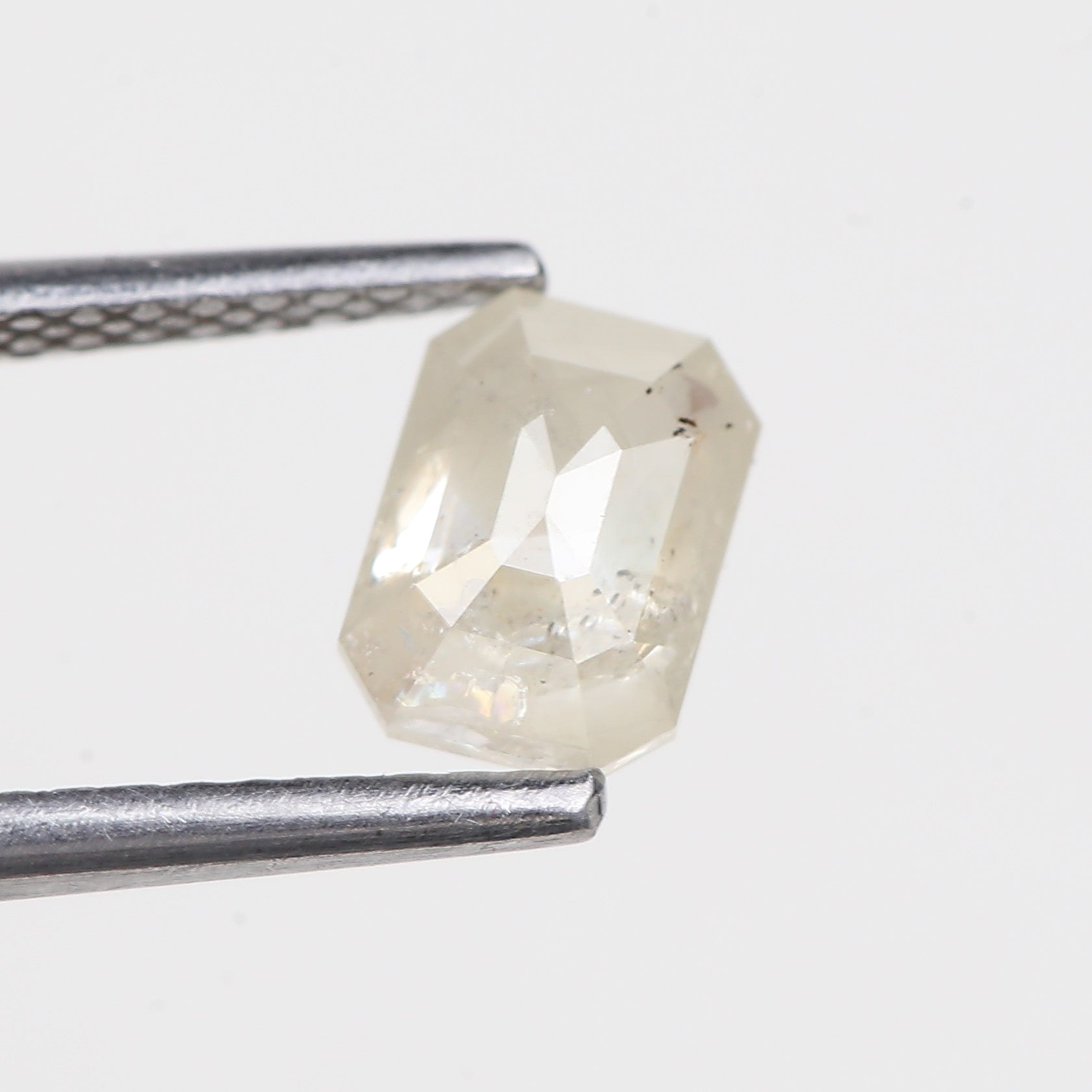 0.87 Carat Emerald Cut Salt and Pepper Diamond 6.37 MM