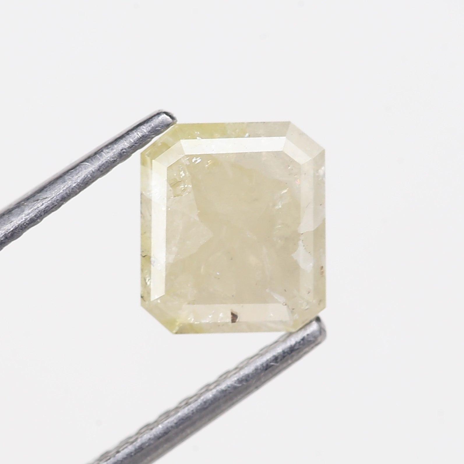 1.56 Carat Natural Emerald Cut Yellowish Gray Salt Pepper Diamond 7.10 MM