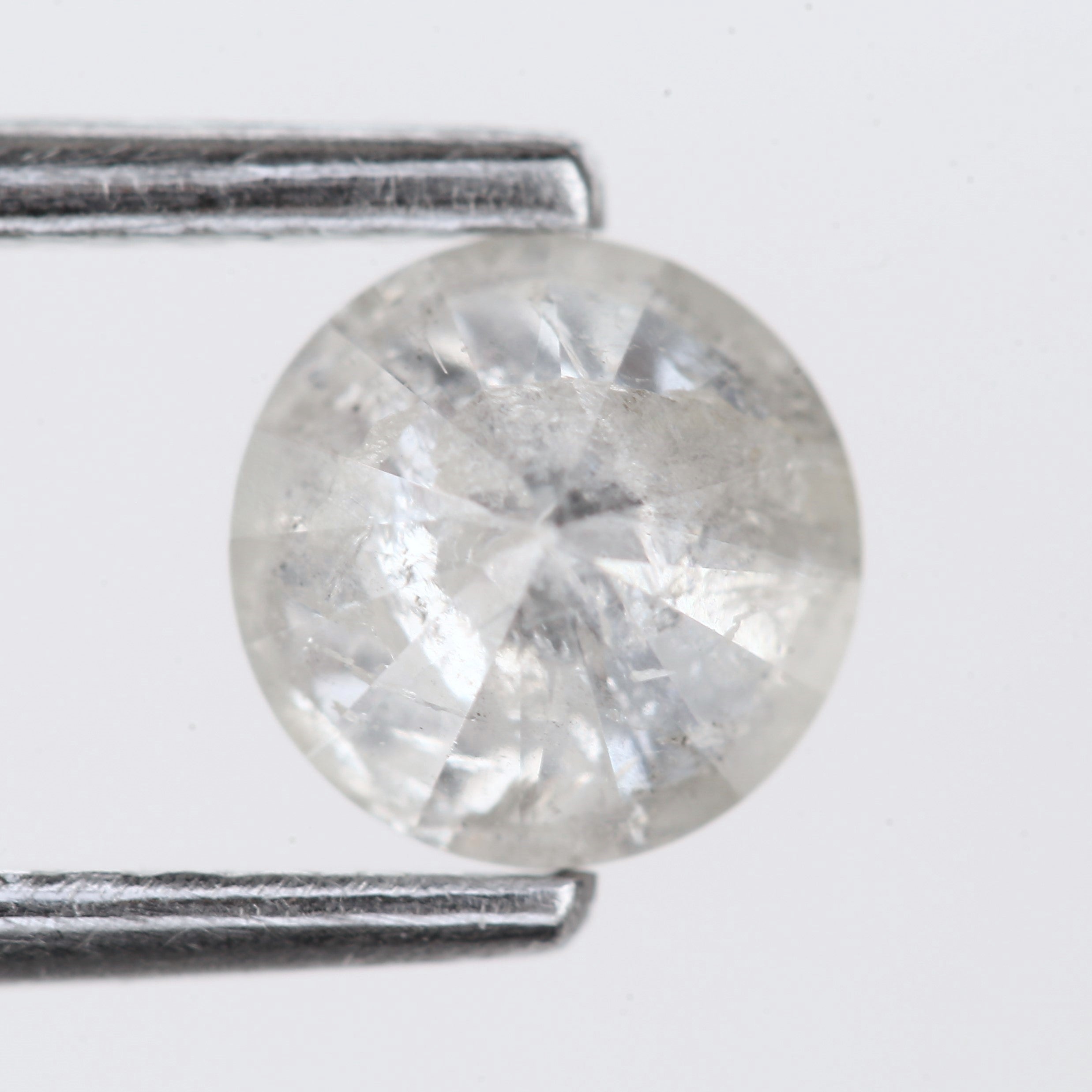 0.66 Carat Opalescent Salt and Pepper Round Shape Diamond 5.3 MM