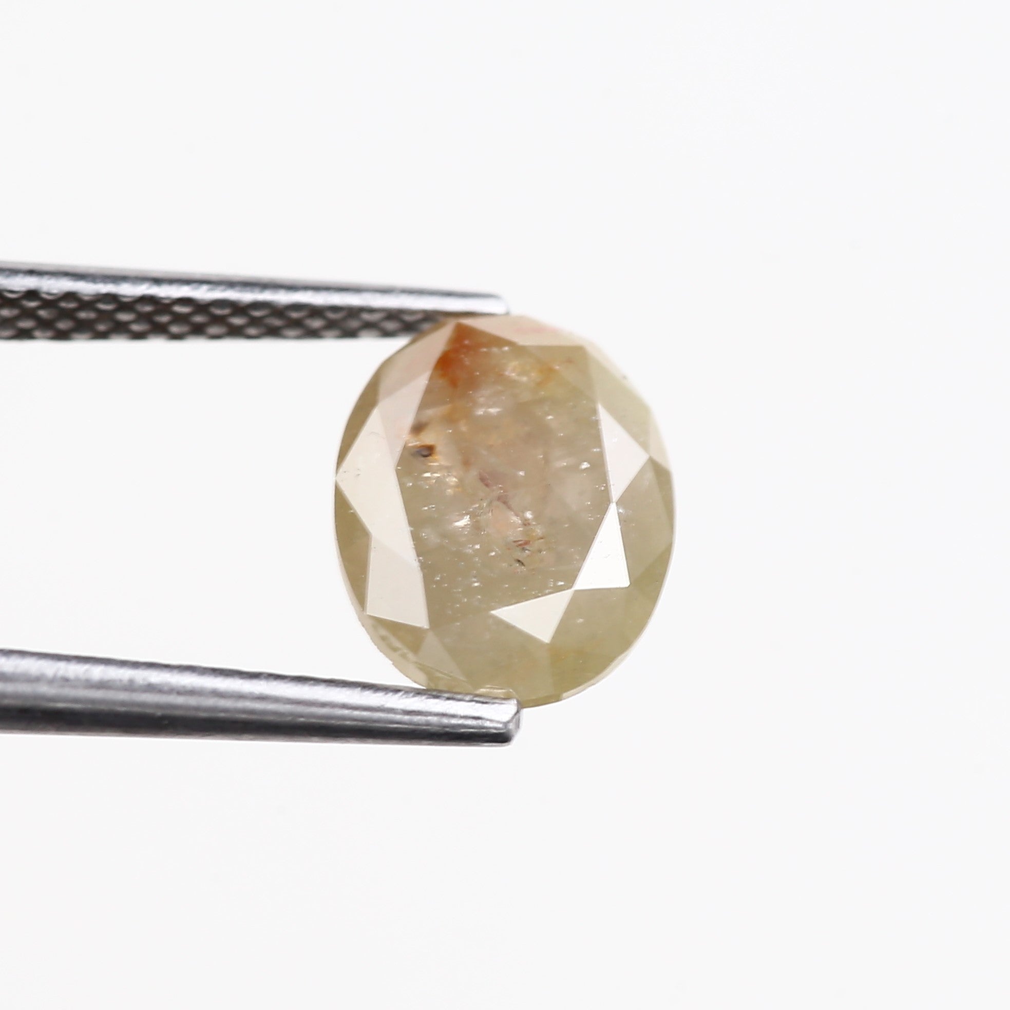 1.69 Carat Natural Yellow Oval Cut Salt and Pepper Diamond 9.15 MM