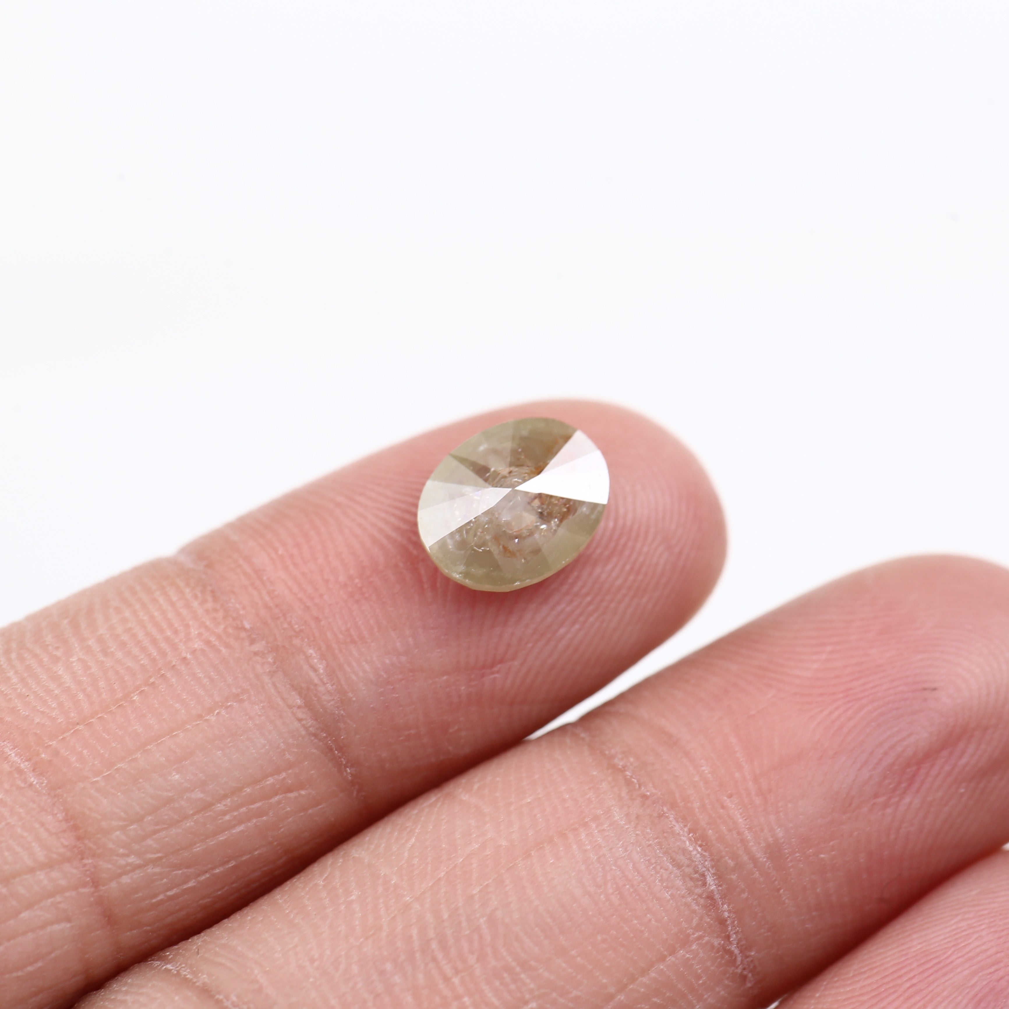 1.69 Carat Natural Yellow Oval Cut Salt and Pepper Diamond 9.15 MM