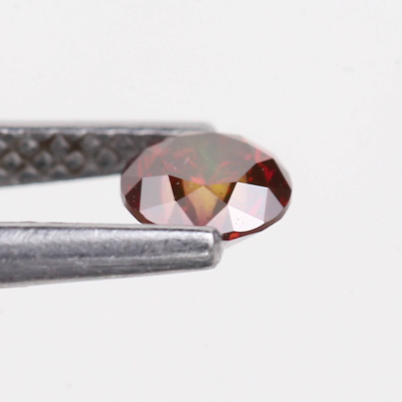 0.32 Carat Natural Fancy Pink Red Salt and Pepper Diamond 4.4 MM