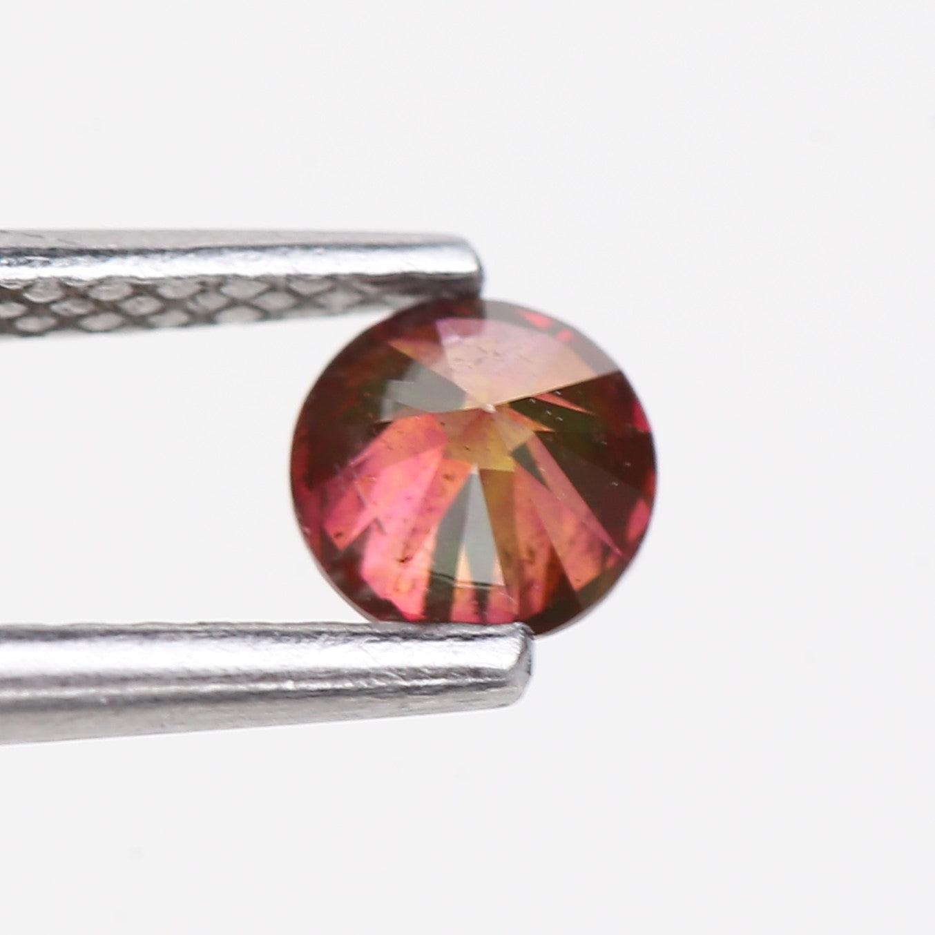 0.32 Carat Natural Fancy Pink Red Salt and Pepper Diamond 4.4 MM