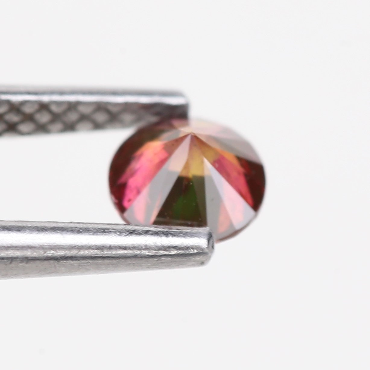 0.32 Carat Natural Fancy Pink Red Salt and Pepper Diamond 4.4 MM