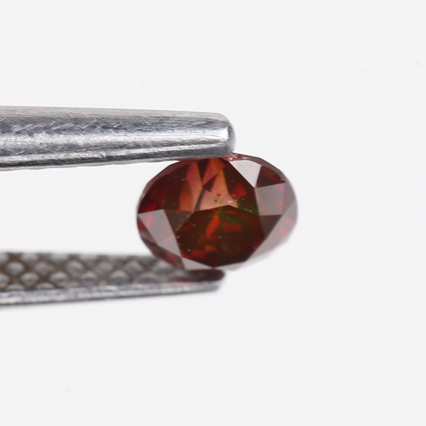0.32 Carat Natural Fancy Pink Red Salt and Pepper Diamond 4.4 MM