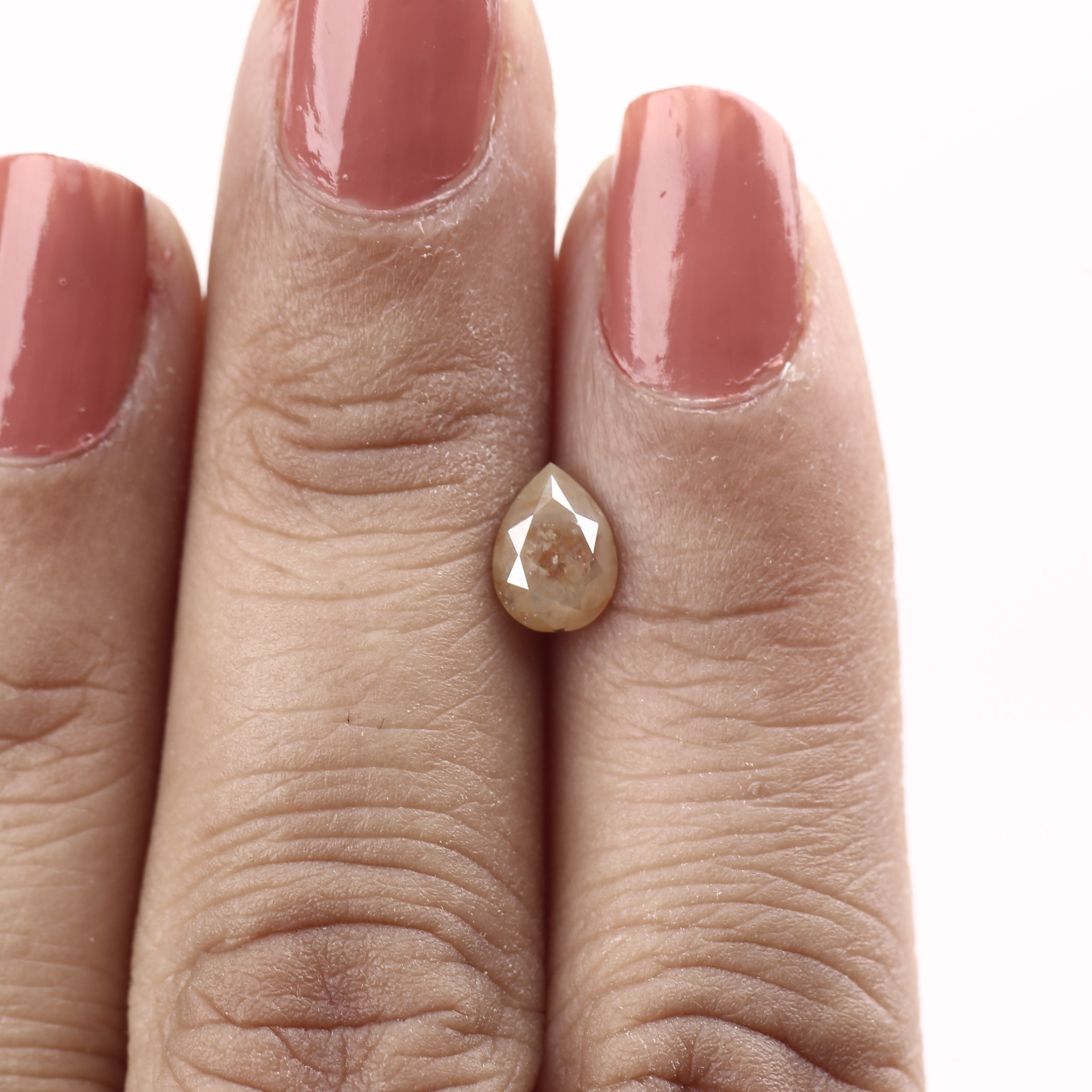0.90 Carat Orange Salt and Pepper Pear Shape Diamond 7.2 MM