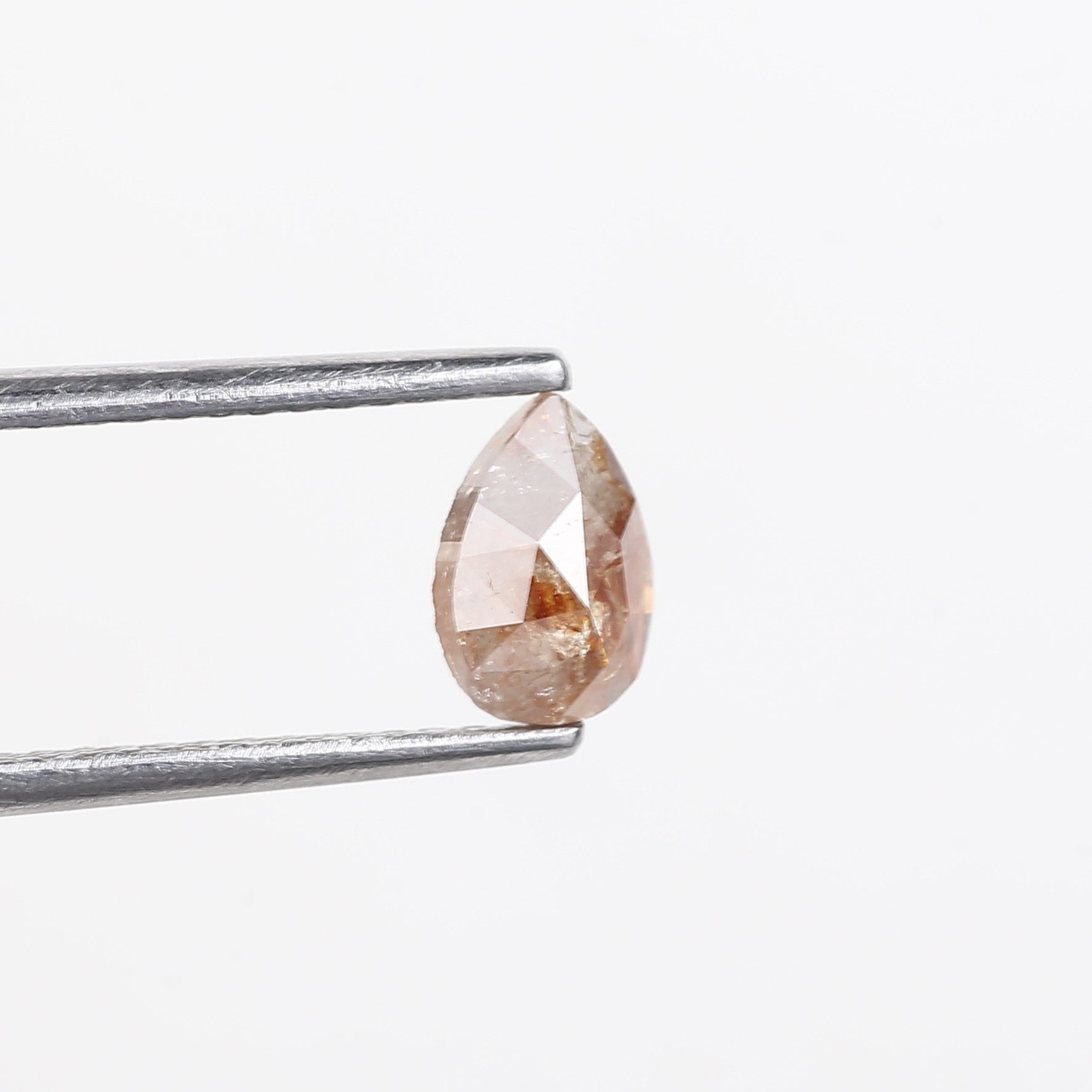0.56 Carat Natural Orange Pear Salt Pepper Diamond 6.5 MM
