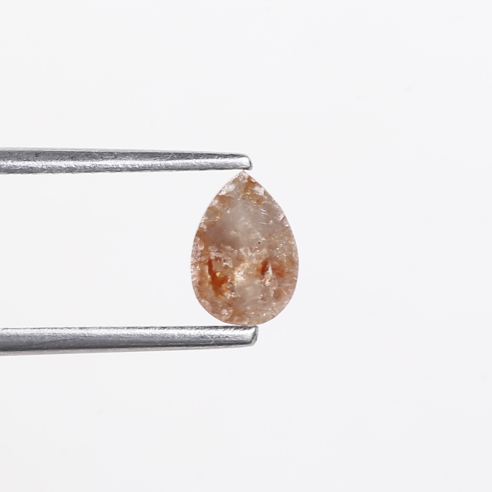 0.56 Carat Natural Orange Pear Salt Pepper Diamond 6.5 MM