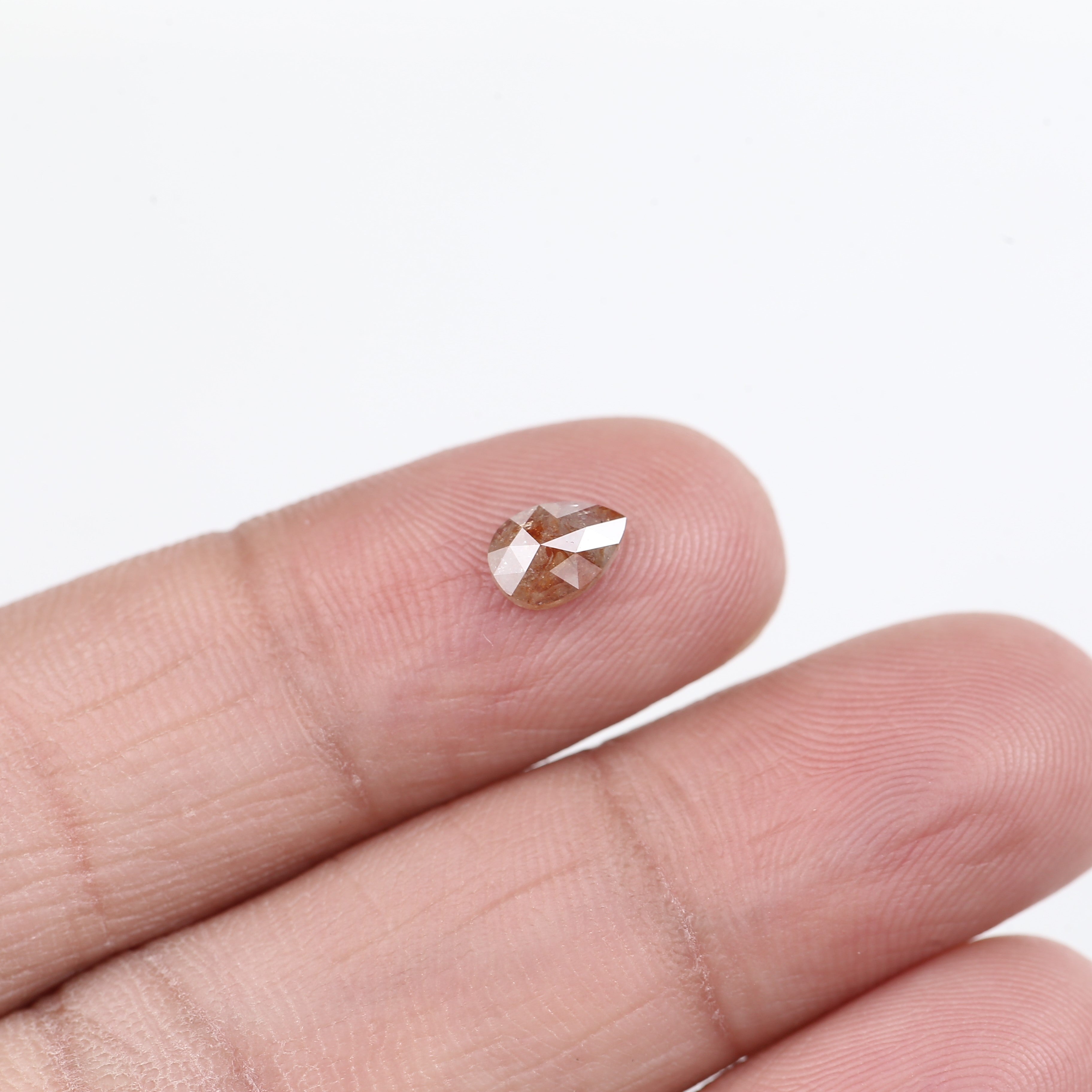 0.56 Carat Natural Orange Pear Salt Pepper Diamond 6.5 MM