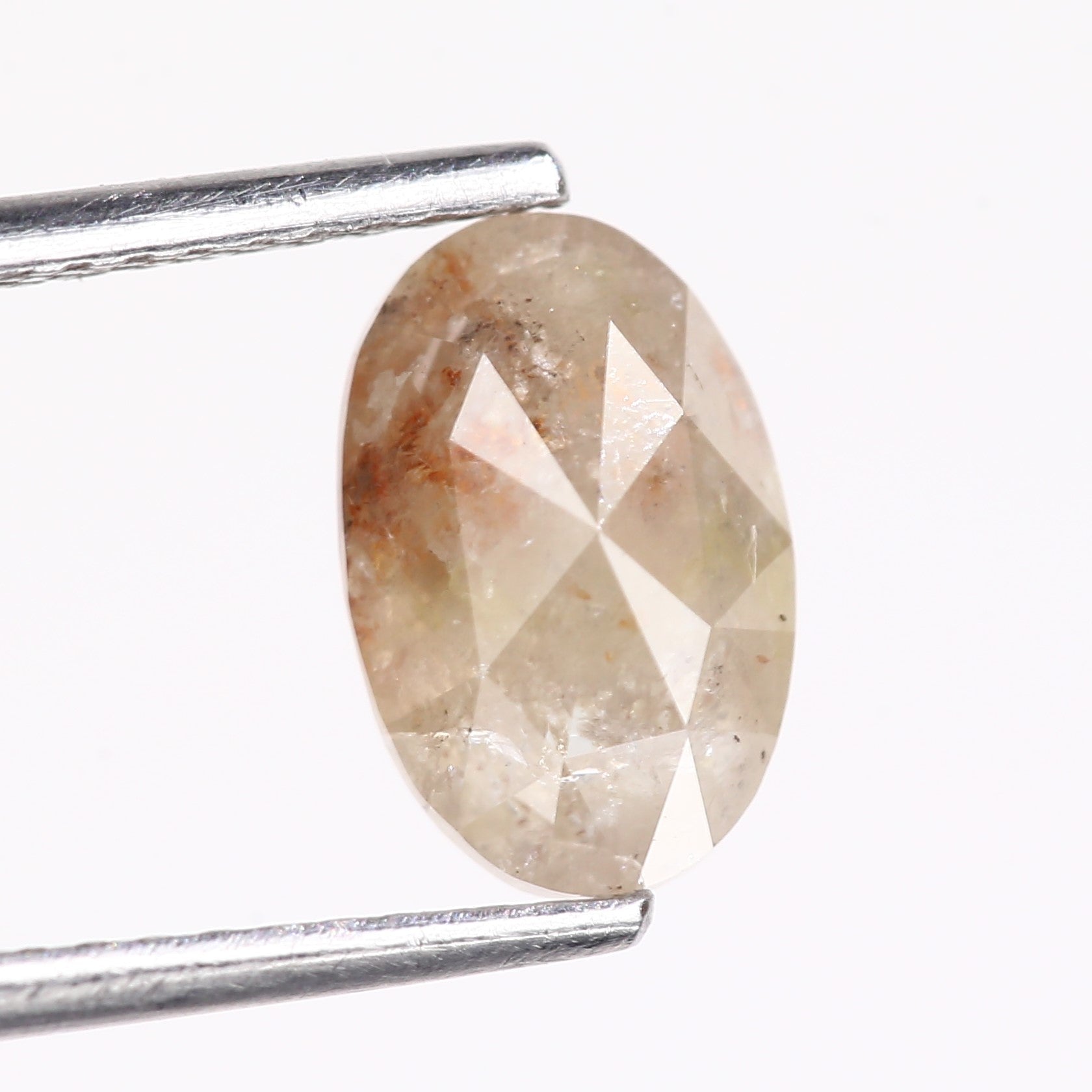 1.70 Carat Natural Oval Cut Orange Salt And Pepper Diamond 8.91 MM