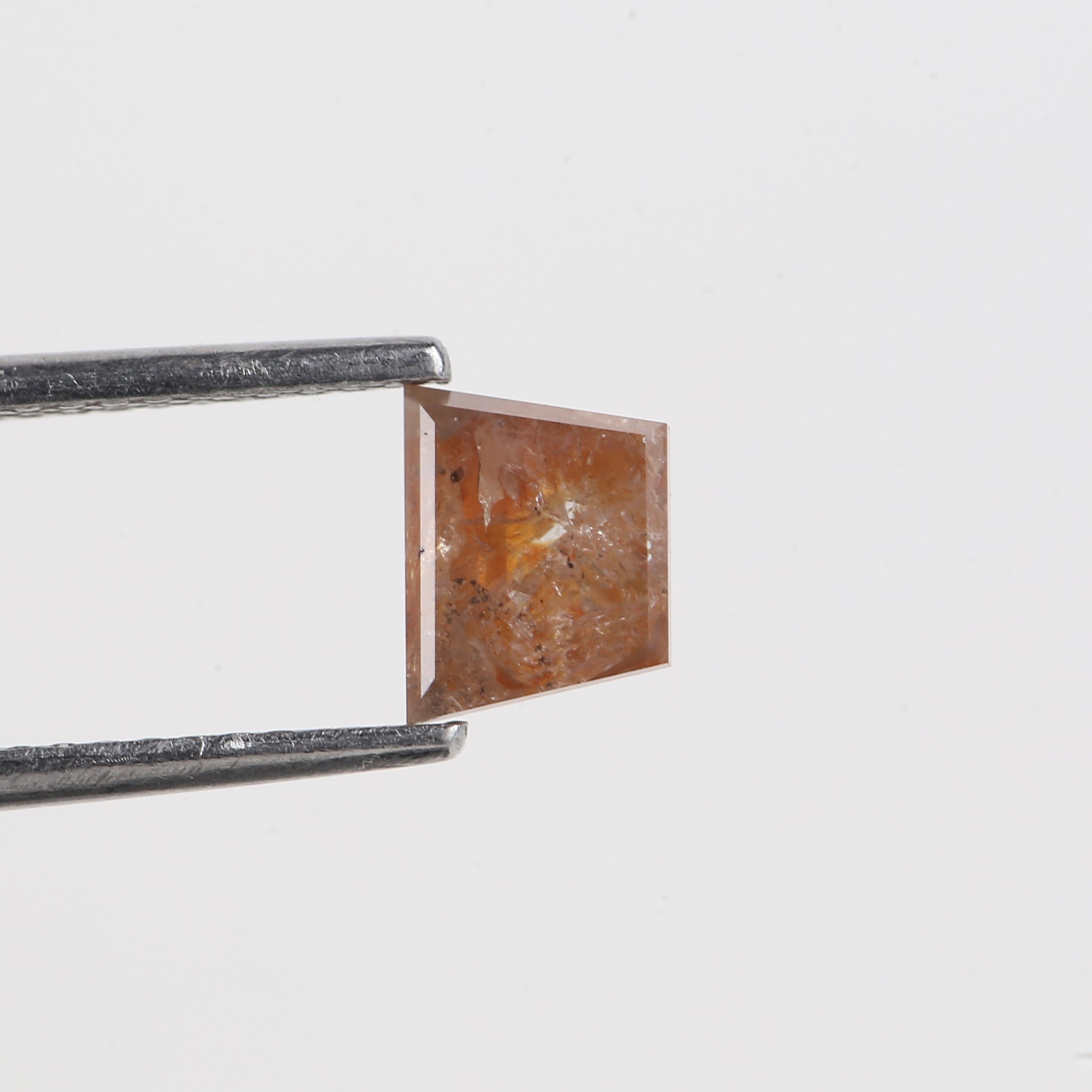 0.92 Carat Trapezoid Natural Orange Salt And Pepper Diamond 6.25 MM