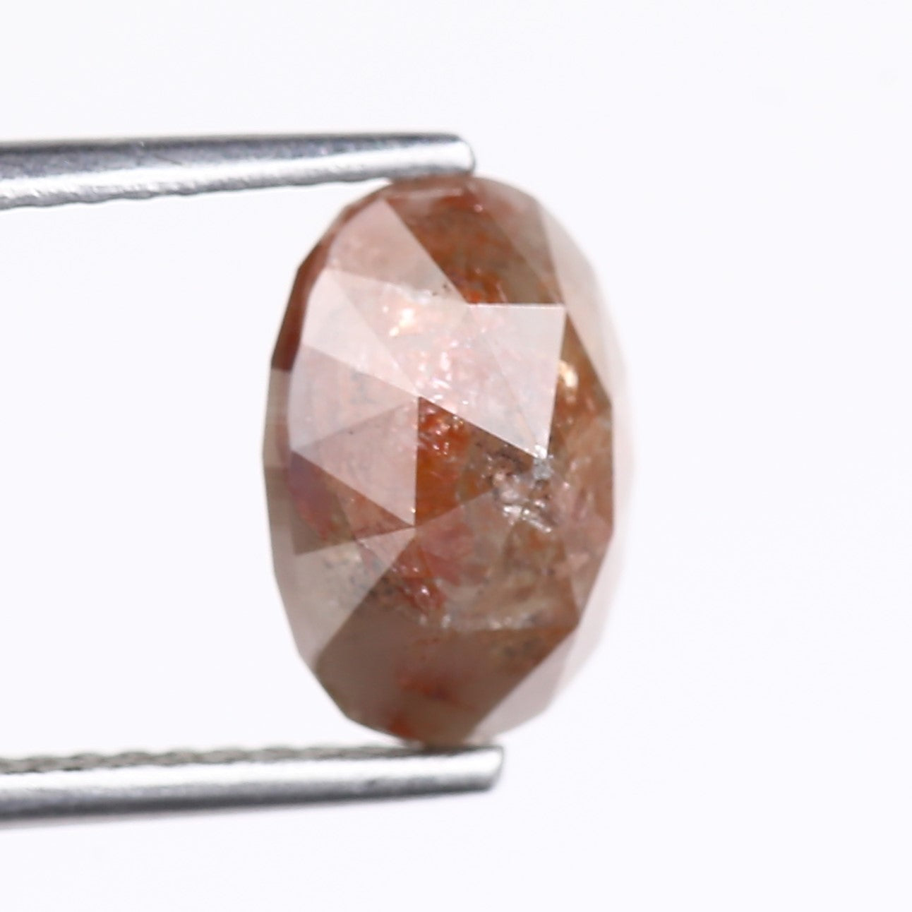 3.12 Carat Natural Orange Oval Cut Salt And Pepper Diamond 9.59 MM