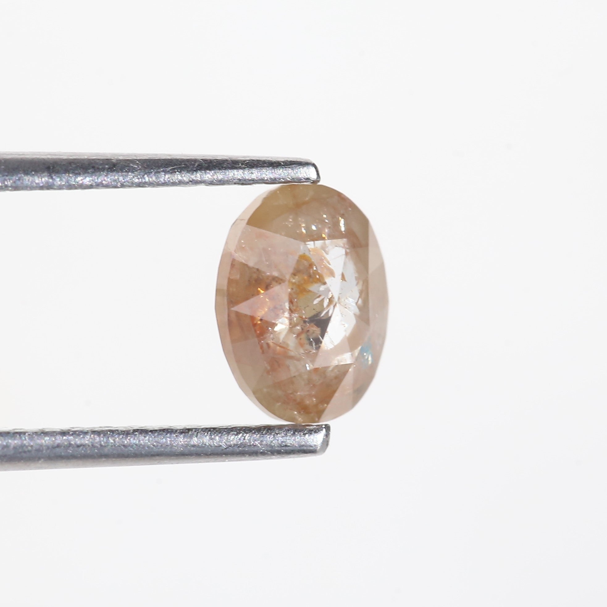 1 Carat Orange Oval Salt and Pepper Diamond 6.7 MM