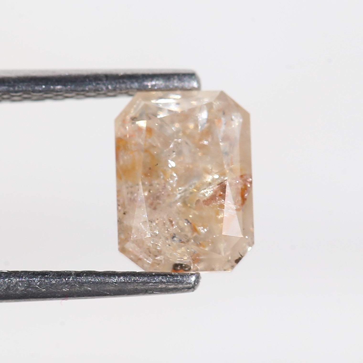 1.4 Carat Orange Emerald Cut Salt and Pepper Diamond 7 MM