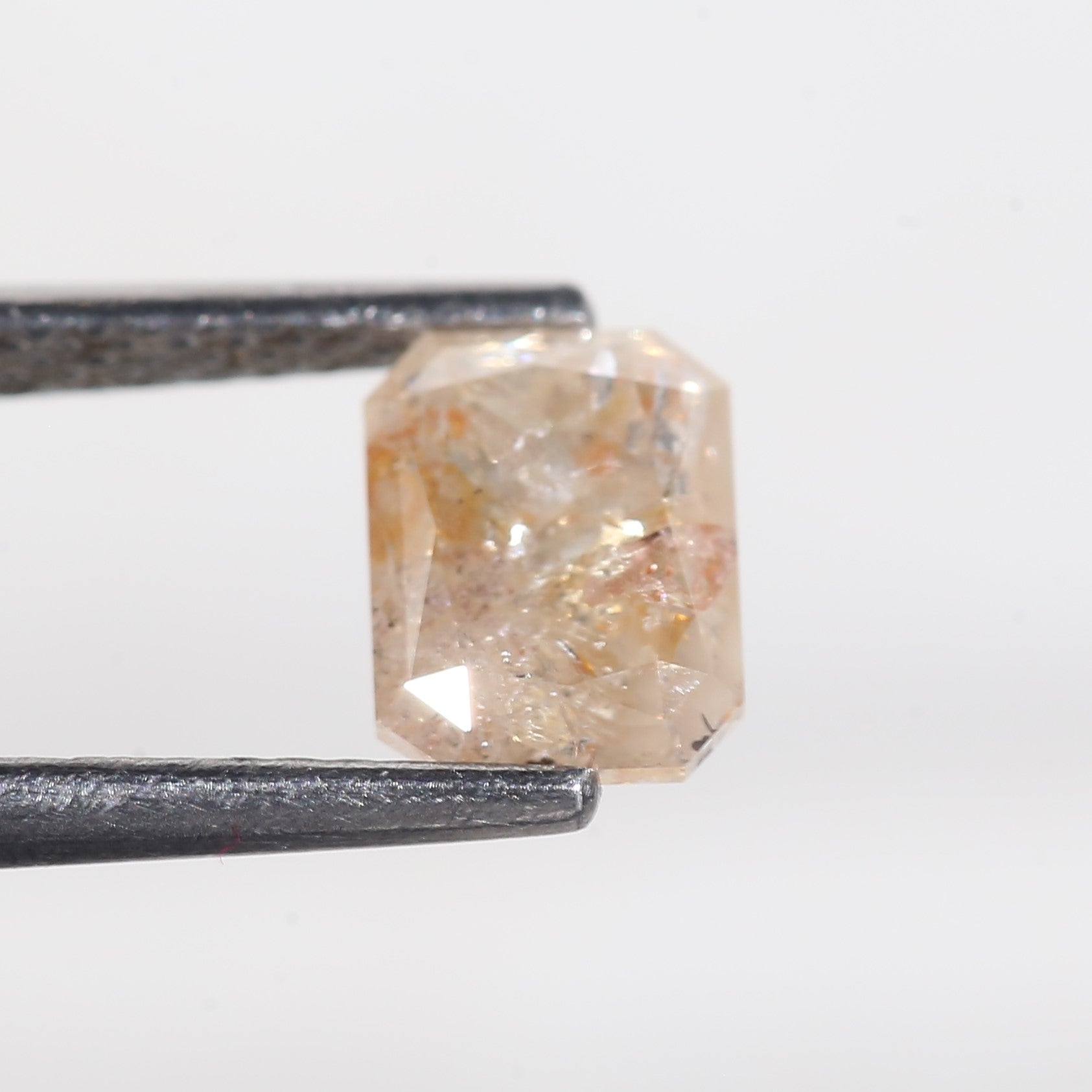 1.4 Carat Orange Emerald Cut Salt and Pepper Diamond 7 MM