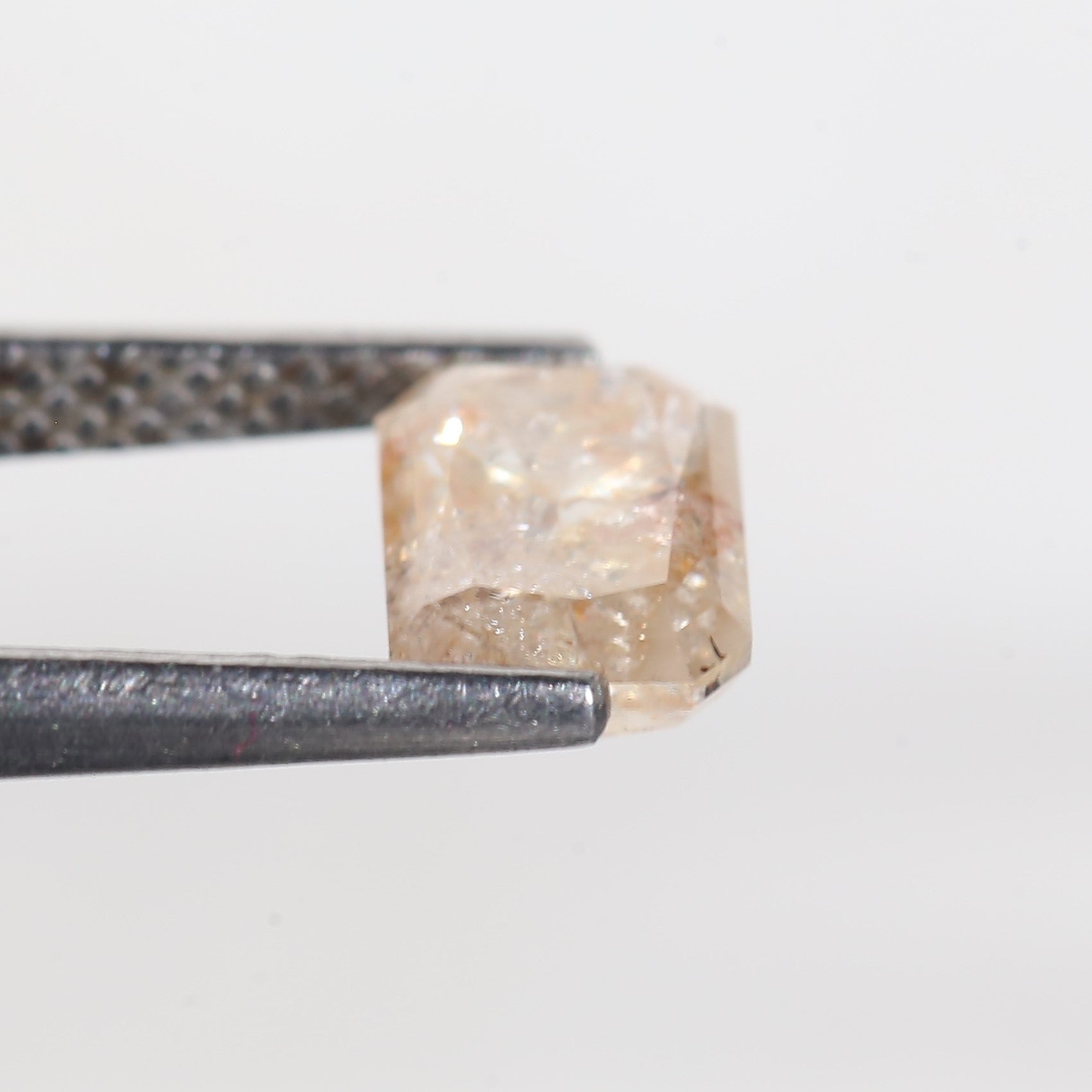 1.4 Carat Orange Emerald Cut Salt and Pepper Diamond 7 MM