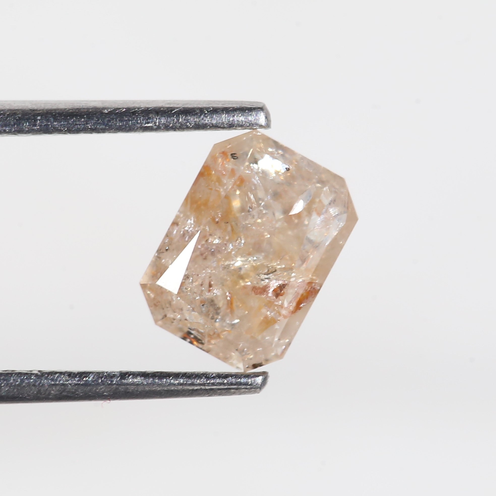 1.4 Carat Orange Emerald Cut Salt and Pepper Diamond 7 MM