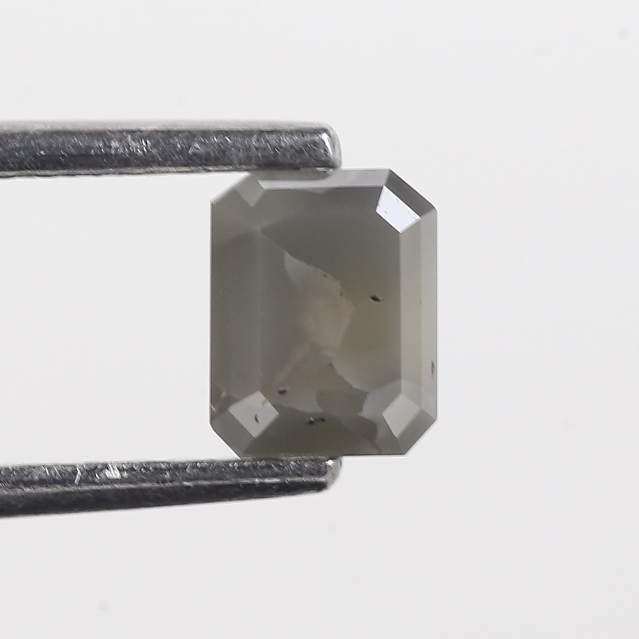 0.62 Carat Grey Emerald Cut Natural Salt And Pepper Diamond 5.28 MM