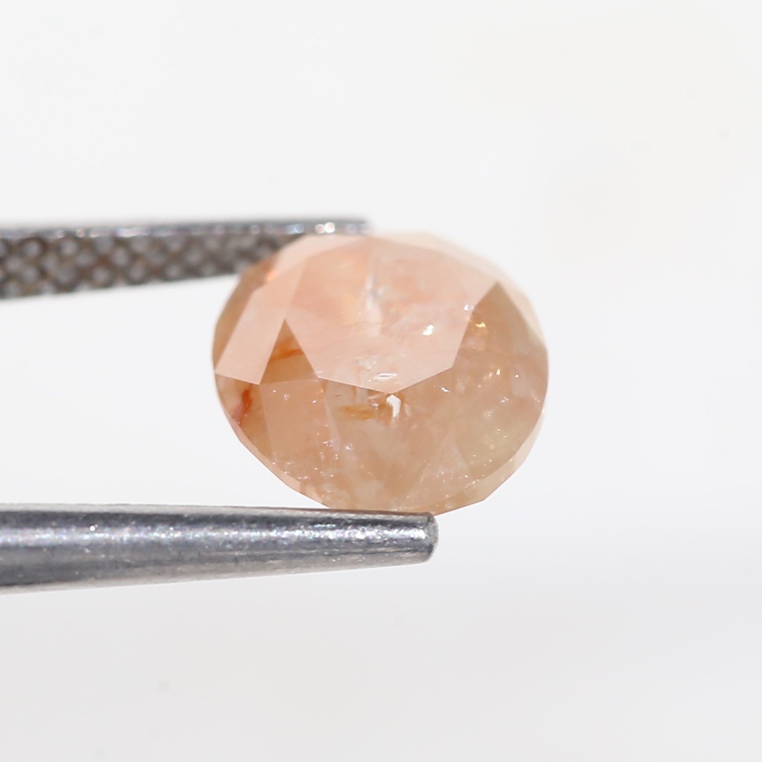 2.57 Carat Oval Cut Orange Salt and Pepper Diamond 7.4 MM