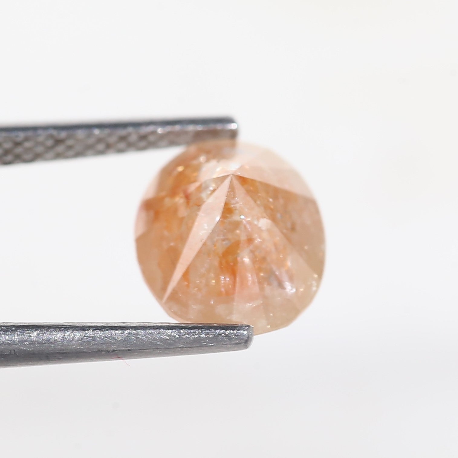 2.57 Carat Oval Cut Orange Salt and Pepper Diamond 7.4 MM