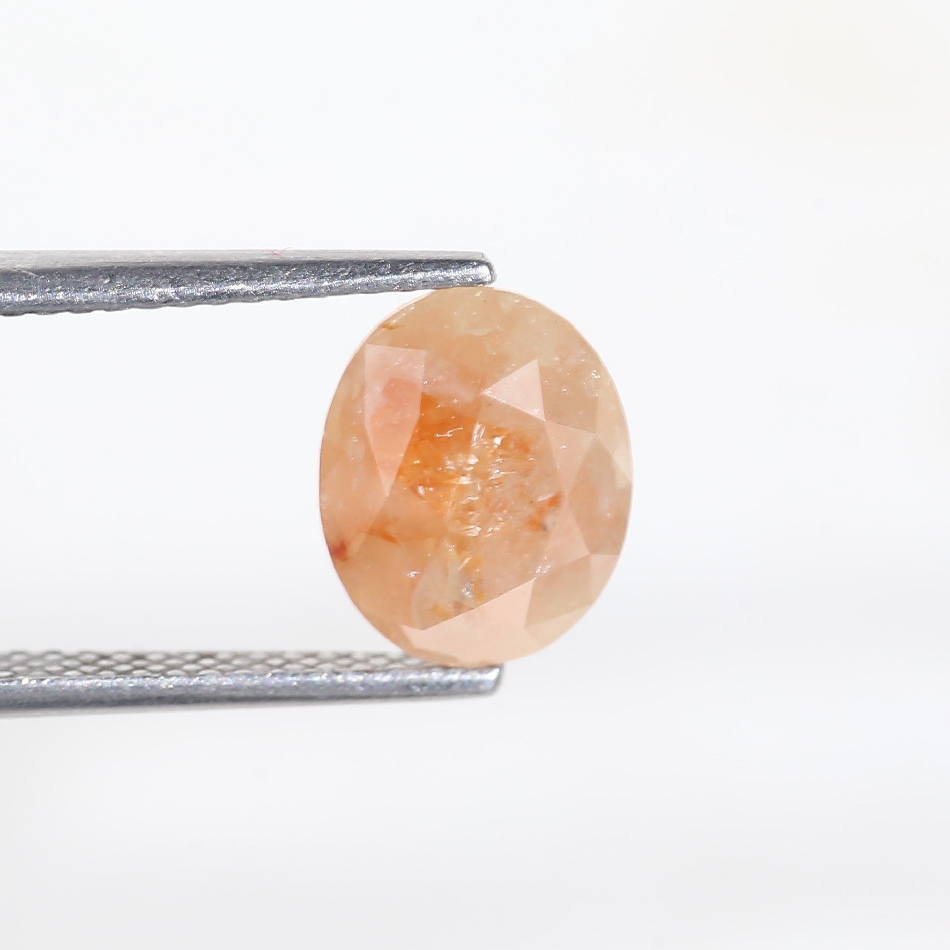 2.57 Carat Oval Cut Orange Salt and Pepper Diamond 7.4 MM