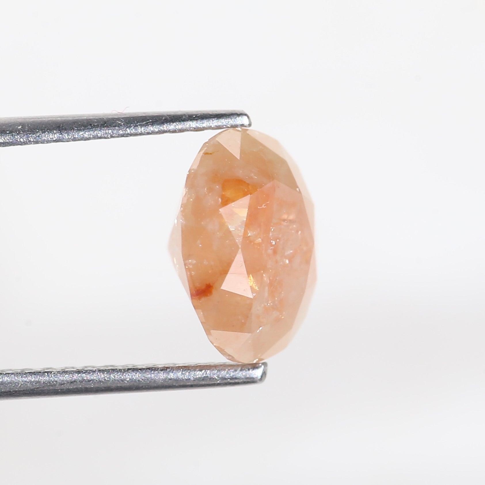 2.57 Carat Oval Cut Orange Salt and Pepper Diamond 7.4 MM