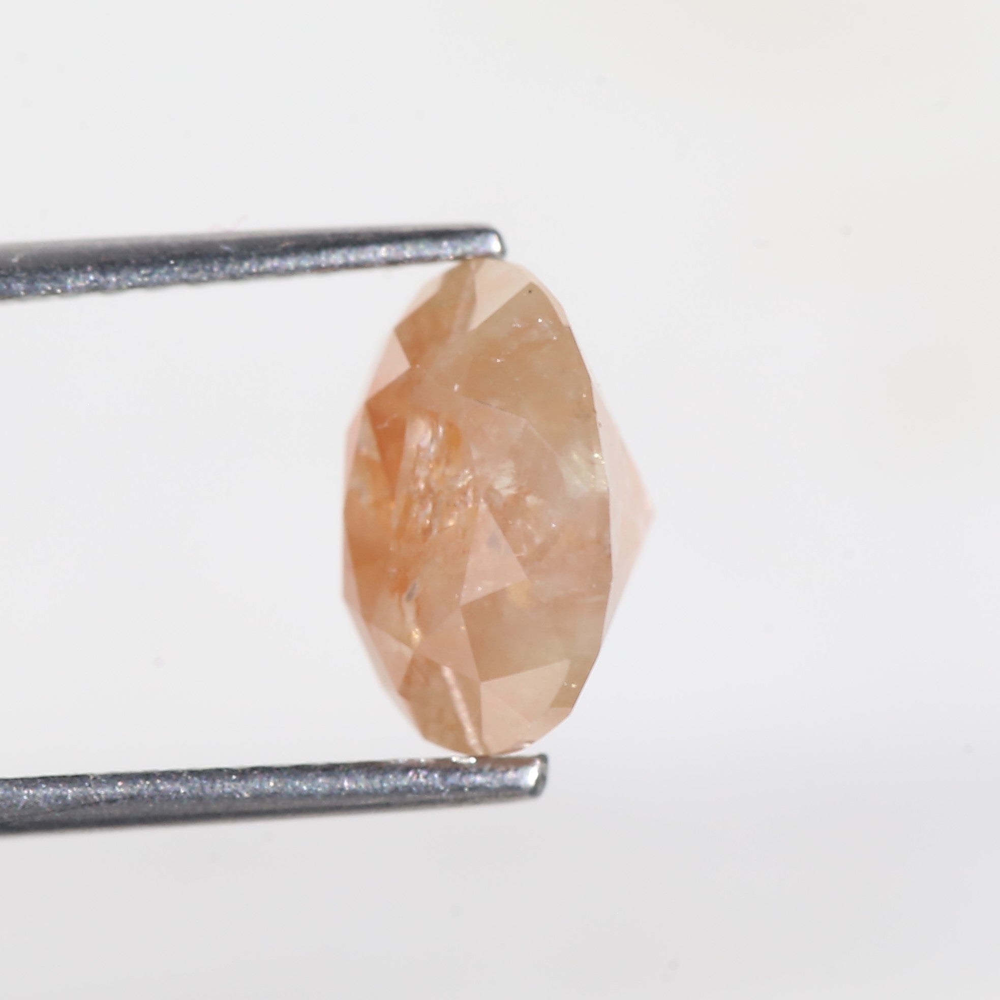 2.57 Carat Oval Cut Orange Salt and Pepper Diamond 7.4 MM