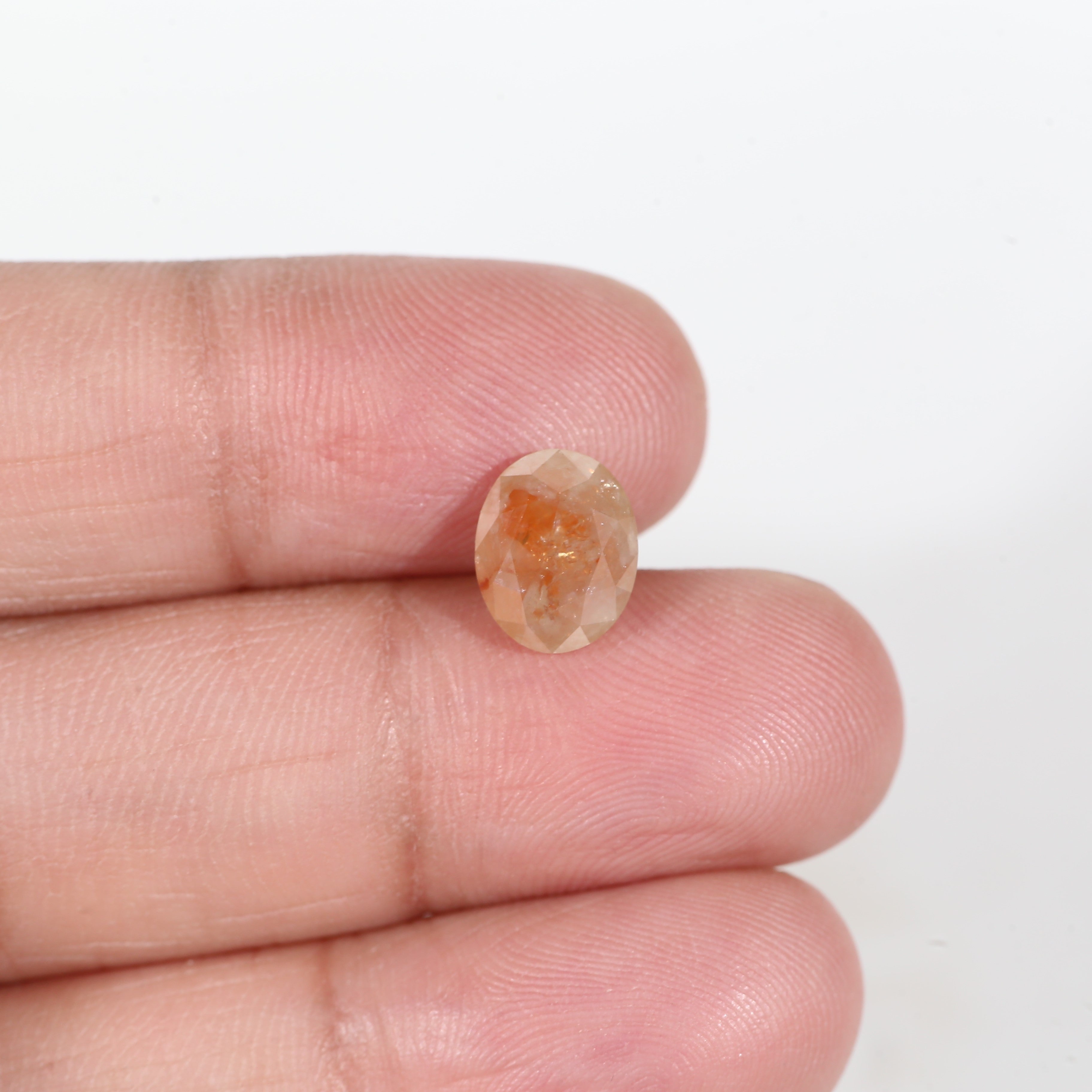2.57 Carat Oval Cut Orange Salt and Pepper Diamond 7.4 MM