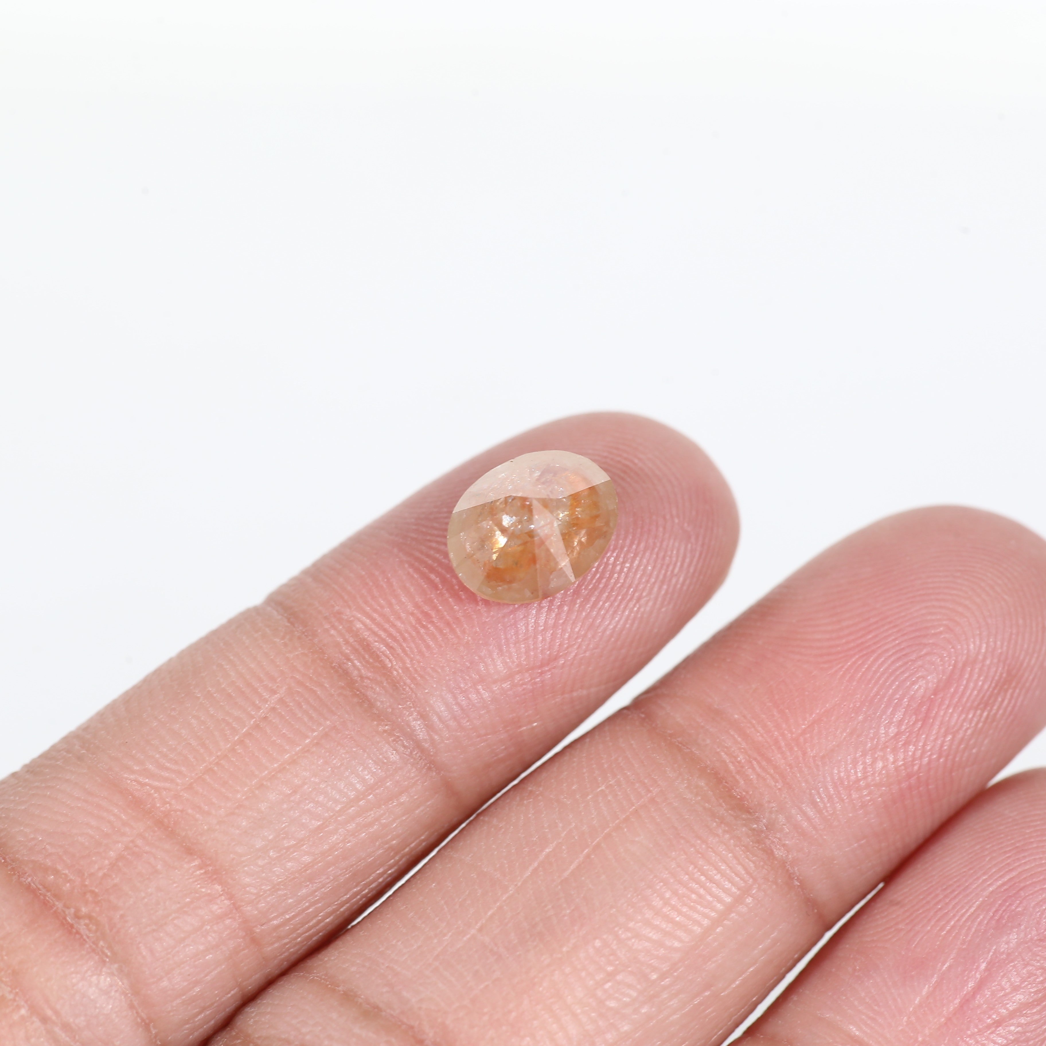 2.57 Carat Oval Cut Orange Salt and Pepper Diamond 7.4 MM