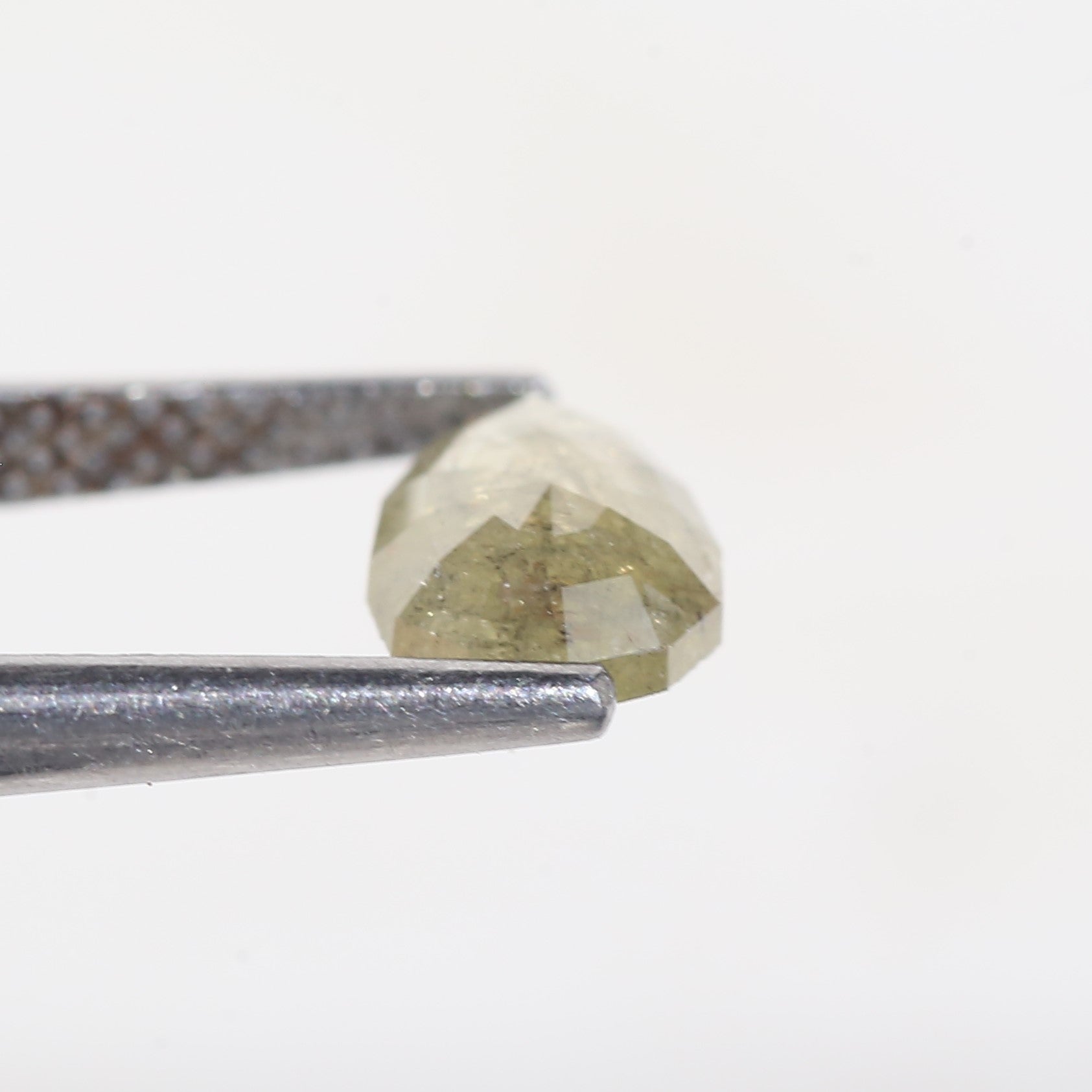 0.77 Carat Modified Pear Cut Salt and Pepper Diamond 7.65 MM