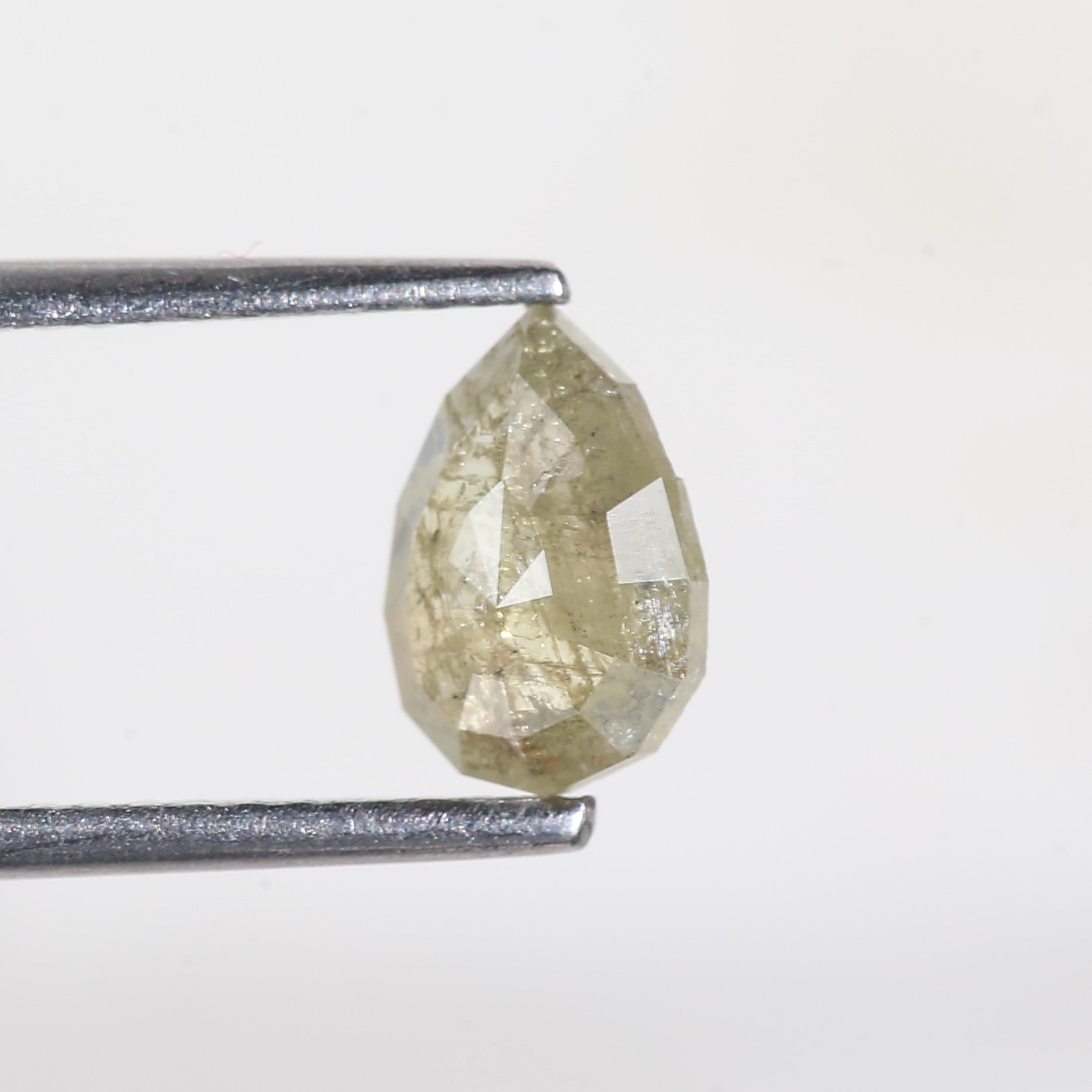 0.77 Carat Modified Pear Cut Salt and Pepper Diamond 7.65 MM