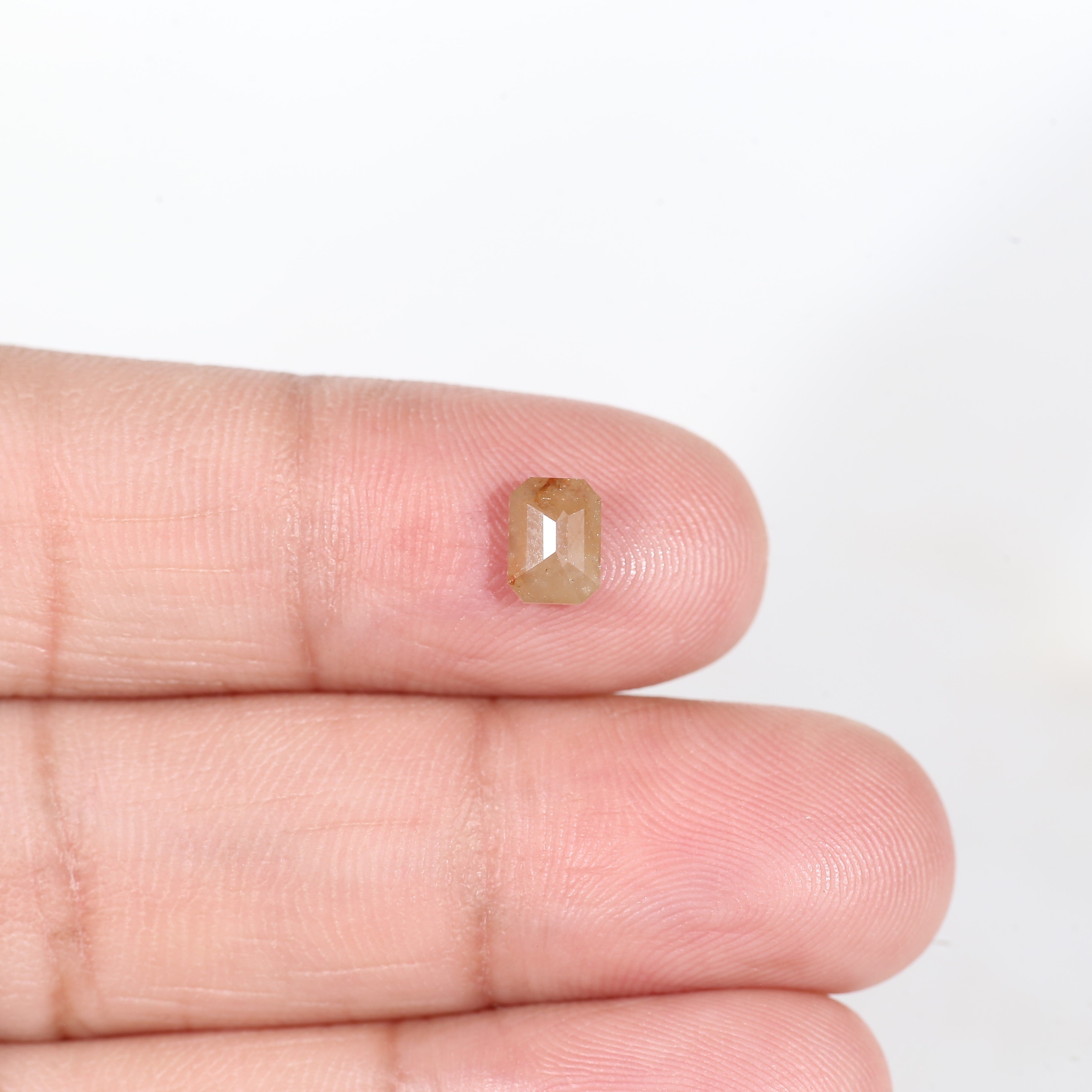 0.78 Carat Orange Natural Emerald Cut Diamond 6.1 MM