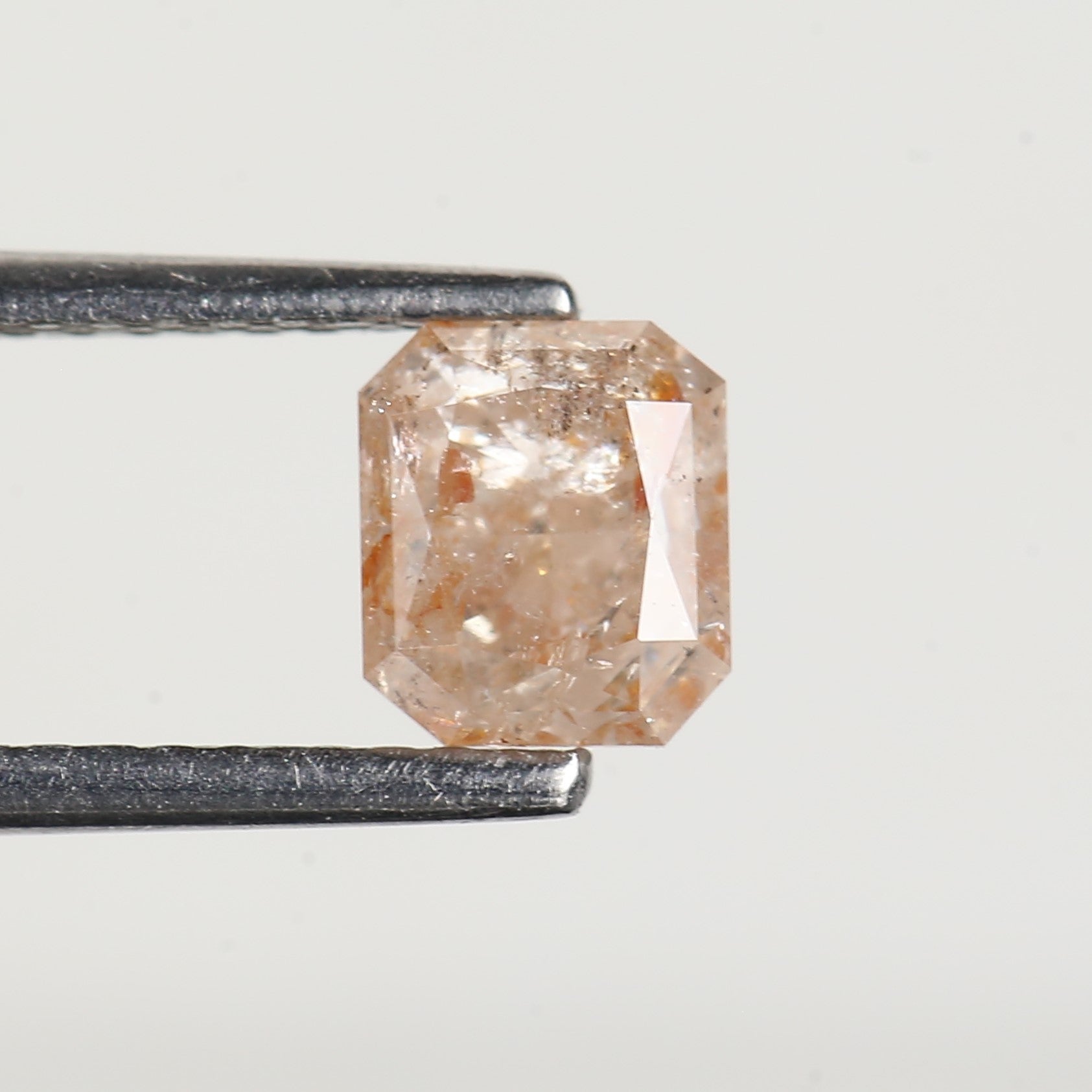 0.95 Carat Emerald Orange Salt and Pepper Diamond 5.6 MM