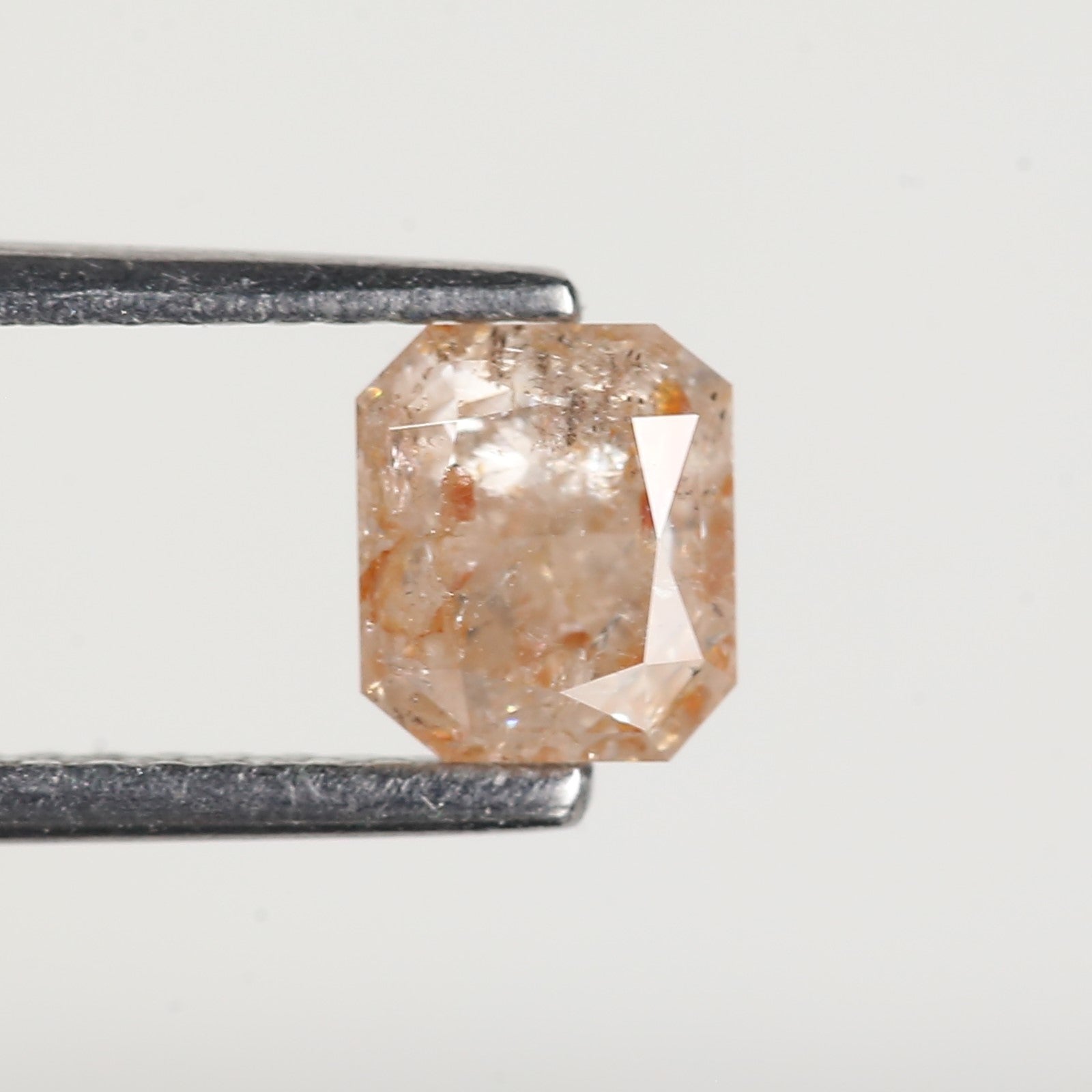 0.95 Carat Emerald Orange Salt and Pepper Diamond 5.6 MM
