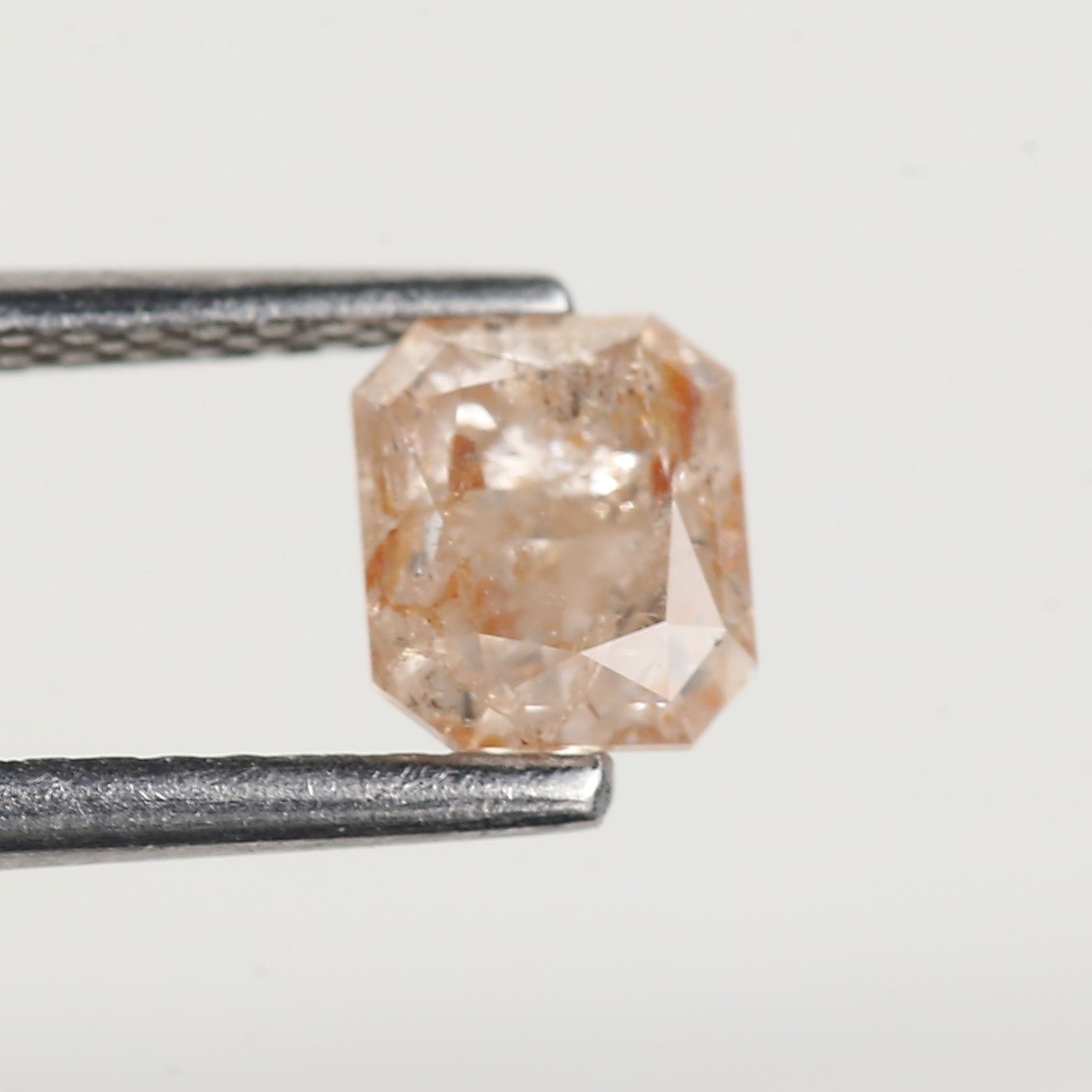 0.95 Carat Emerald Orange Salt and Pepper Diamond 5.6 MM
