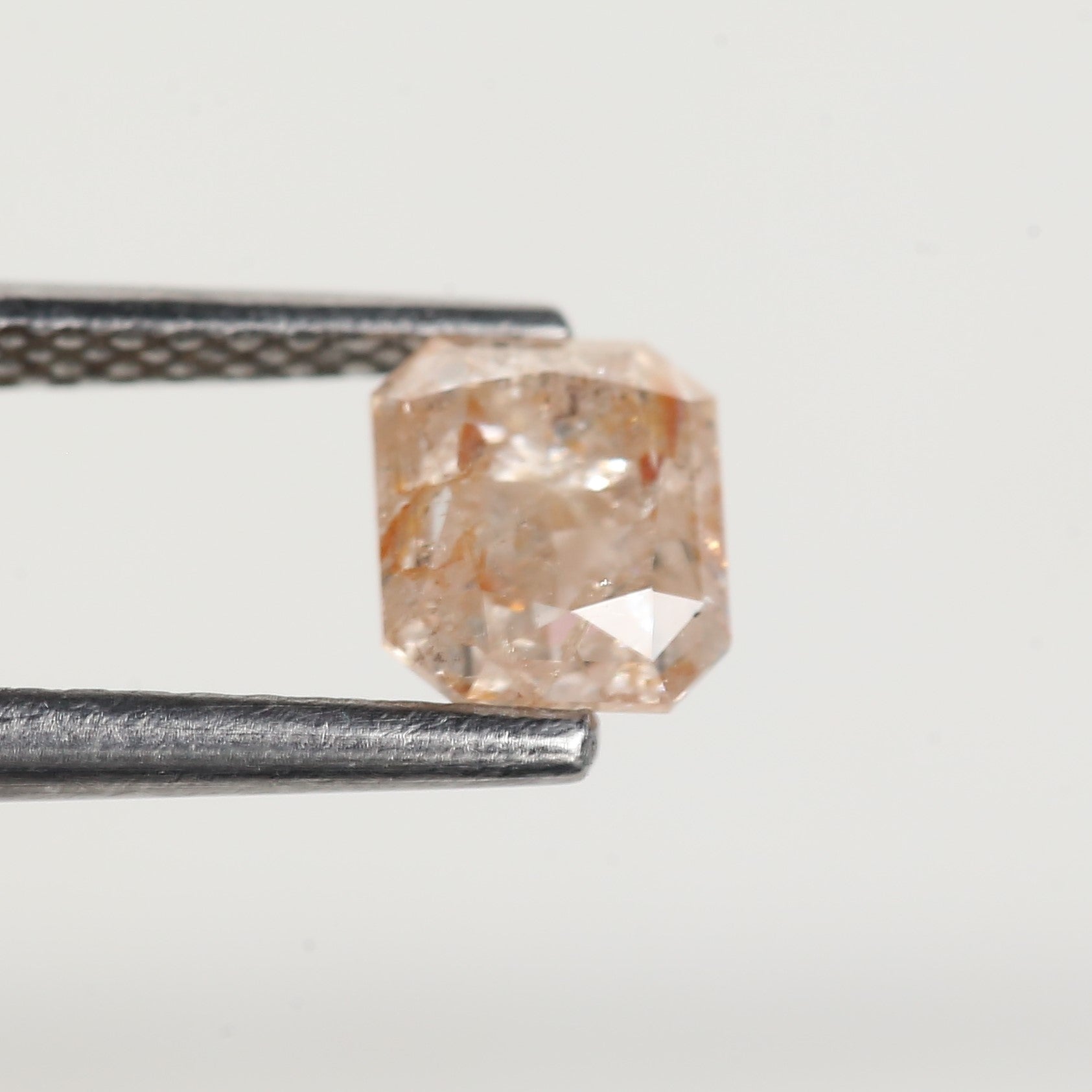 0.95 Carat Emerald Orange Salt and Pepper Diamond 5.6 MM