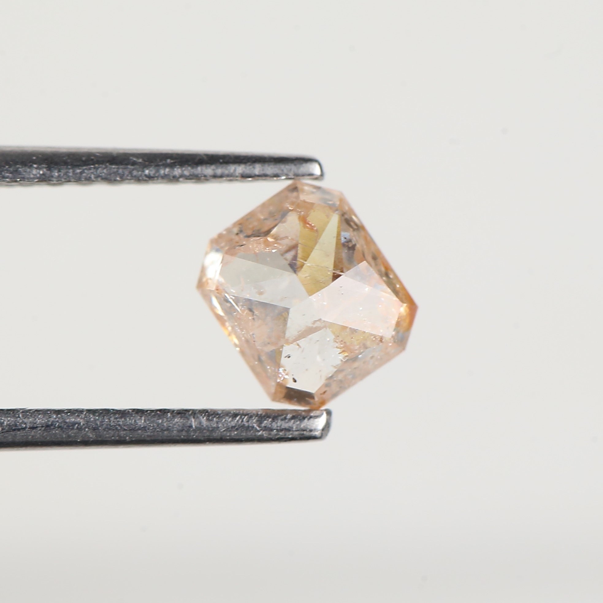 0.95 Carat Emerald Orange Salt and Pepper Diamond 5.6 MM
