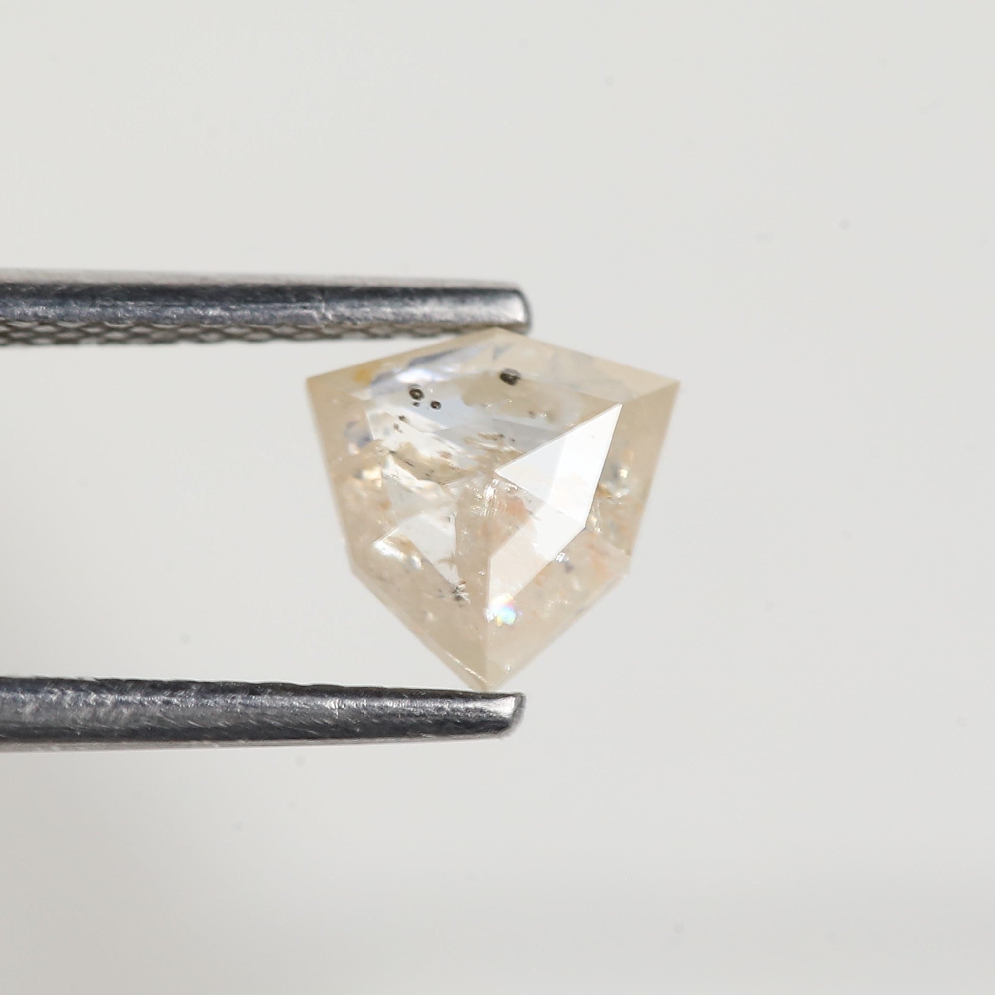 0.72 Carat Natural Shield Cut Orange Salt and Pepper Diamond 6.3 MM